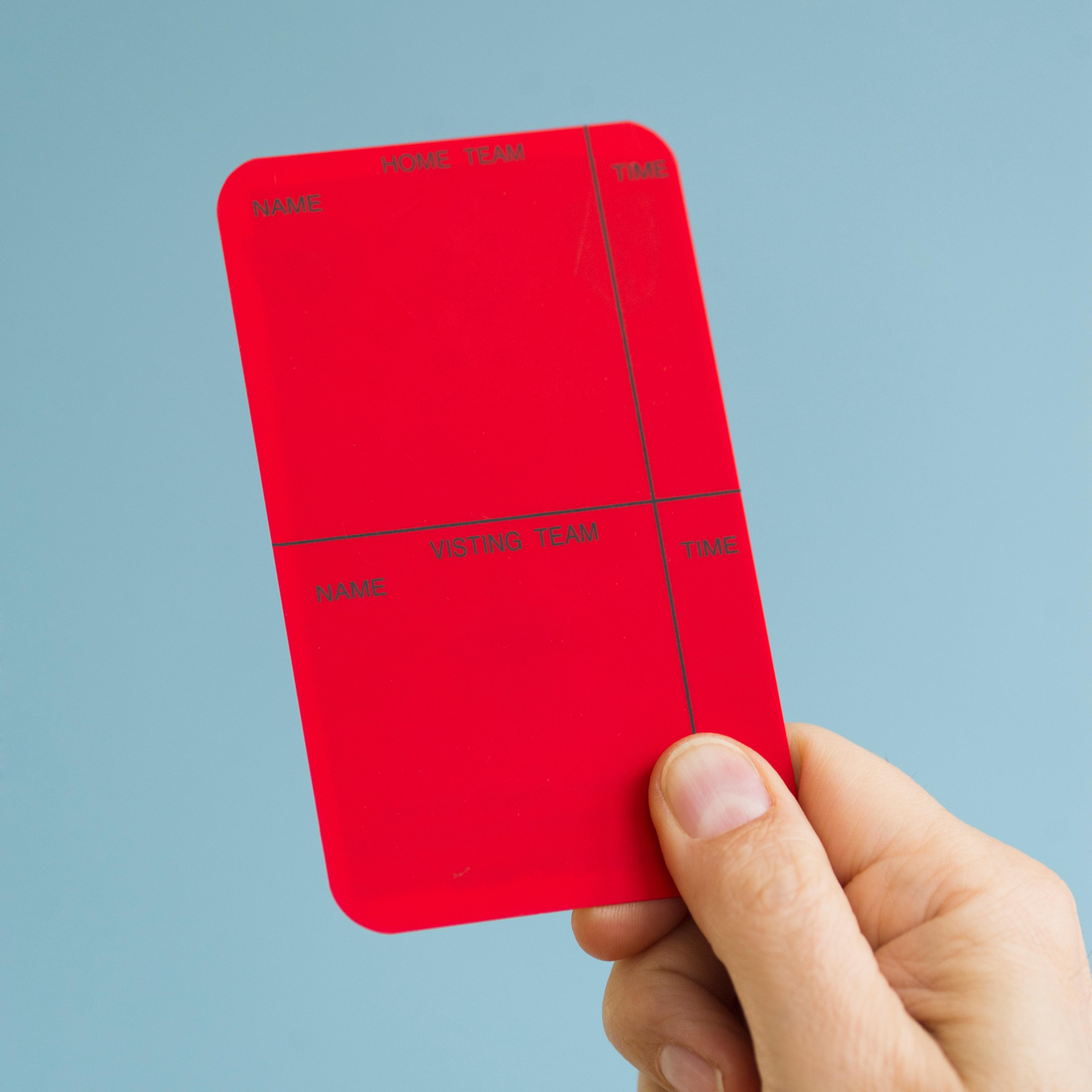 hand-holding-red-card