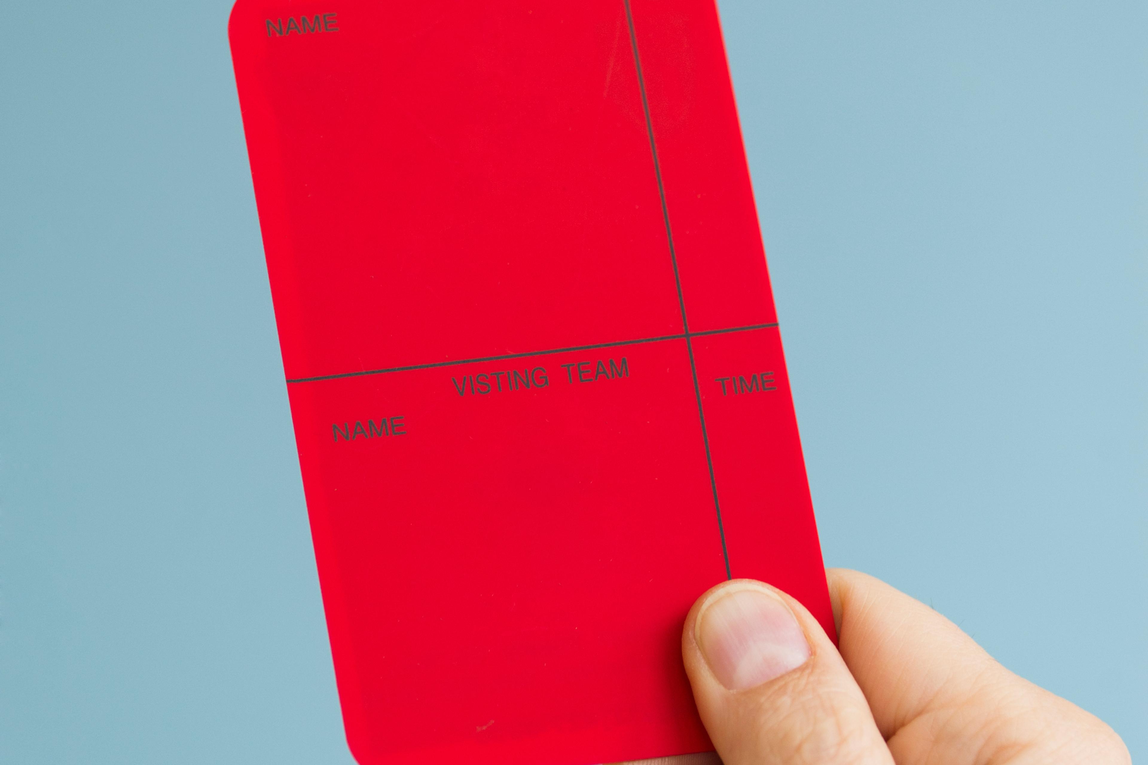 hand-holding-red-card