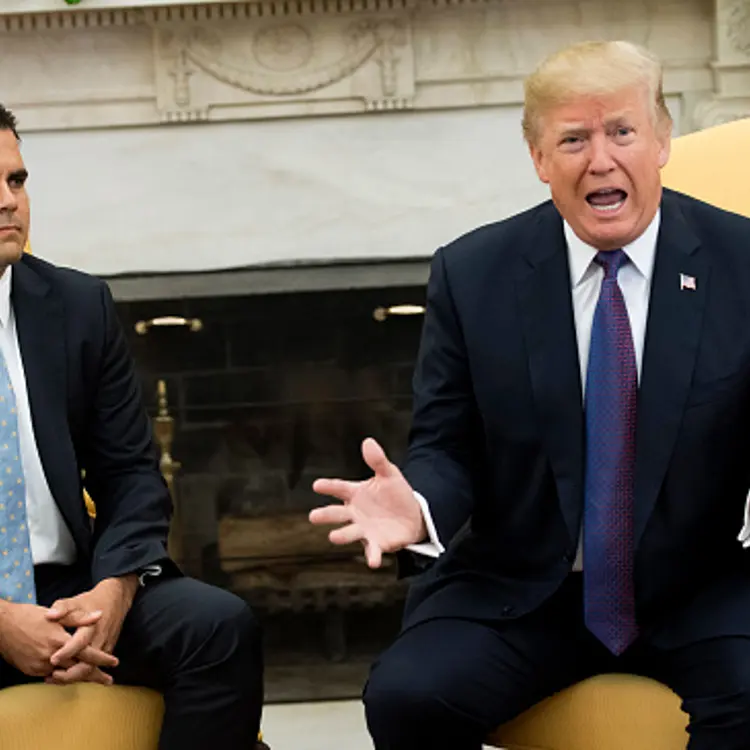 President Donald Trump speaks with Governor Ricardo Rossello of Puerto Rico during a meeting in the Oval Office at the White House on October 19, 2017 in Washington, D.C.
