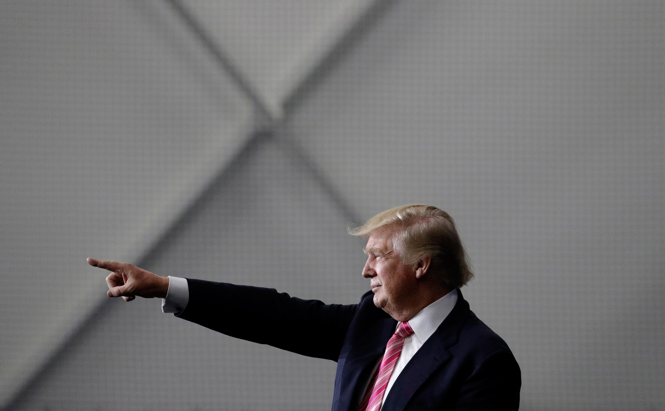 Republican presidential candidate Donald Trump motions to the crowd after speaking at a rally, Saturday, Oct. 1, 2016, in Manheim, Pa. (AP Photo/John Locher)