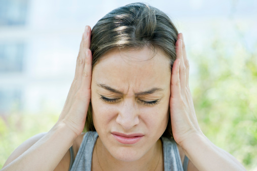 woman-covering-ears