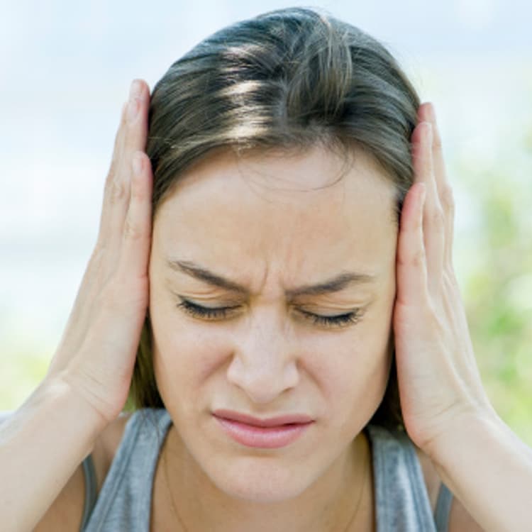 woman-covering-ears