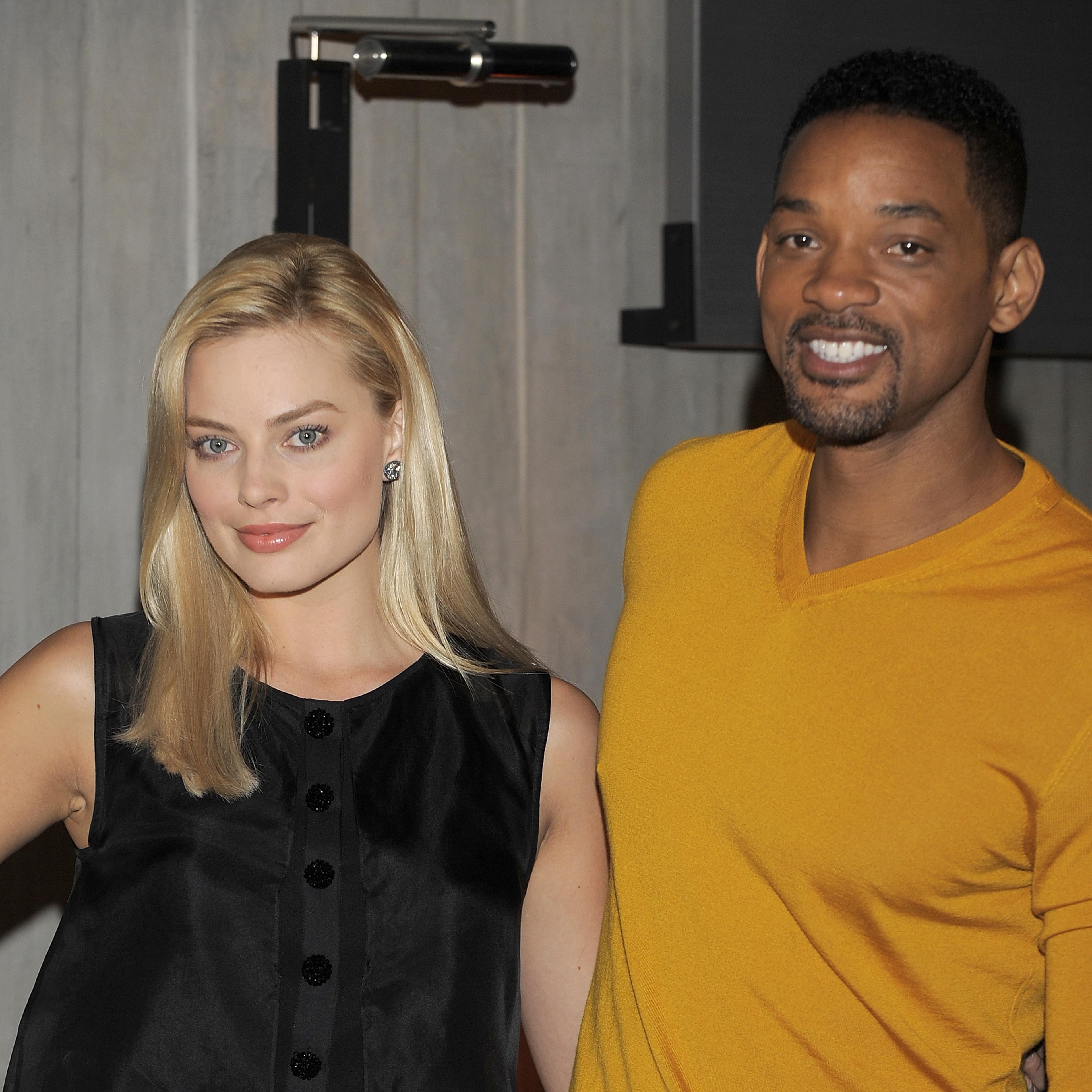 Actors Margot Robbie and Will Smith attend a press conference for 'Focus' in Buenos Aires, Argentina on Nov. 20, 2013.