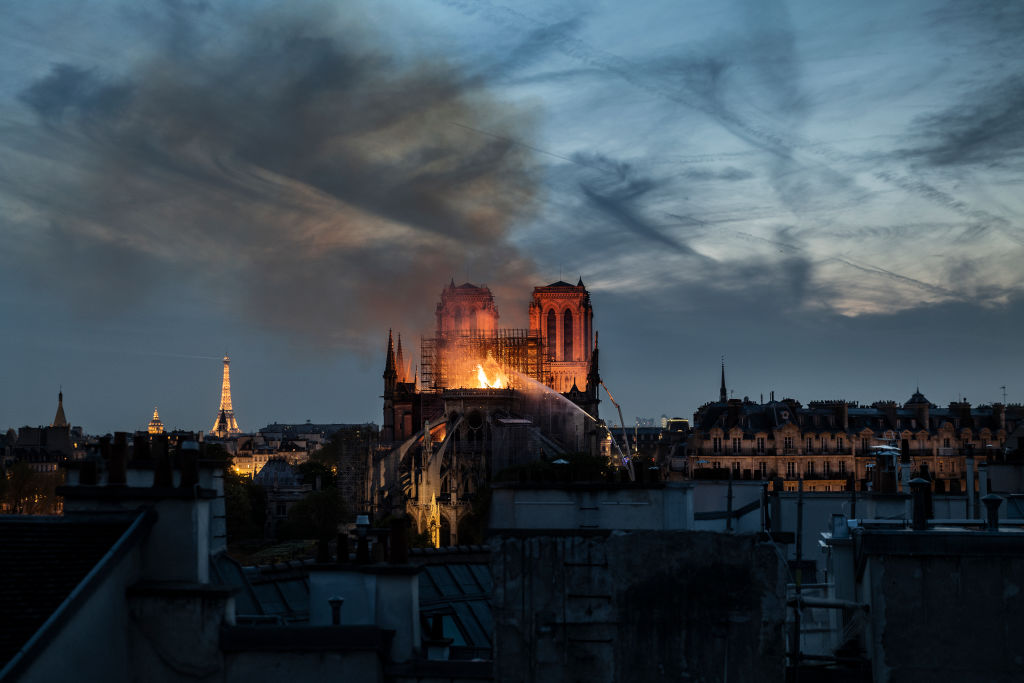 A Paris judicial official says investigators have questioned about 30 people after the fire at Notre Dame Cathedral.