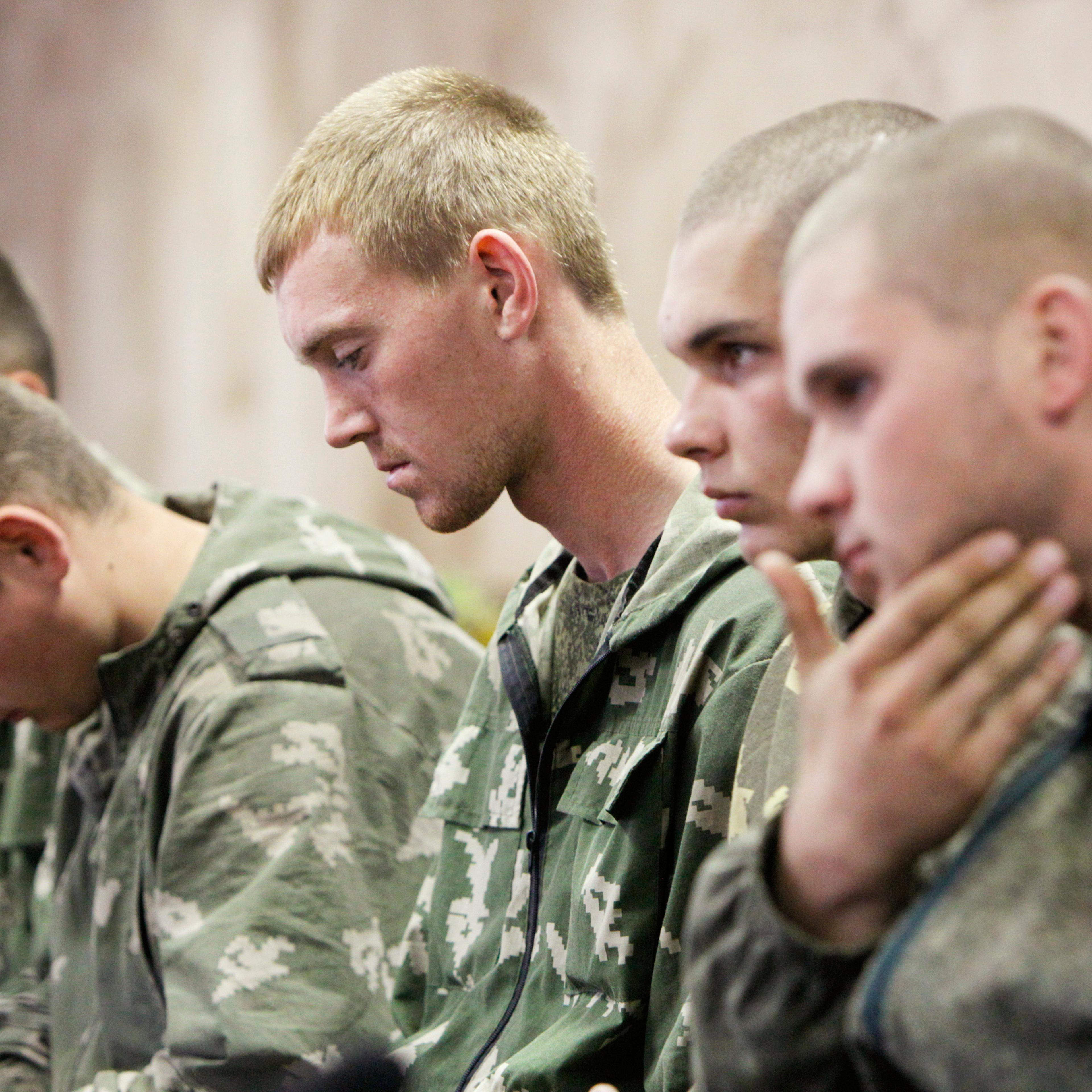 A group of Russian servicemen, who are detained by Ukrainian authorities, attend a news conference in Kiev