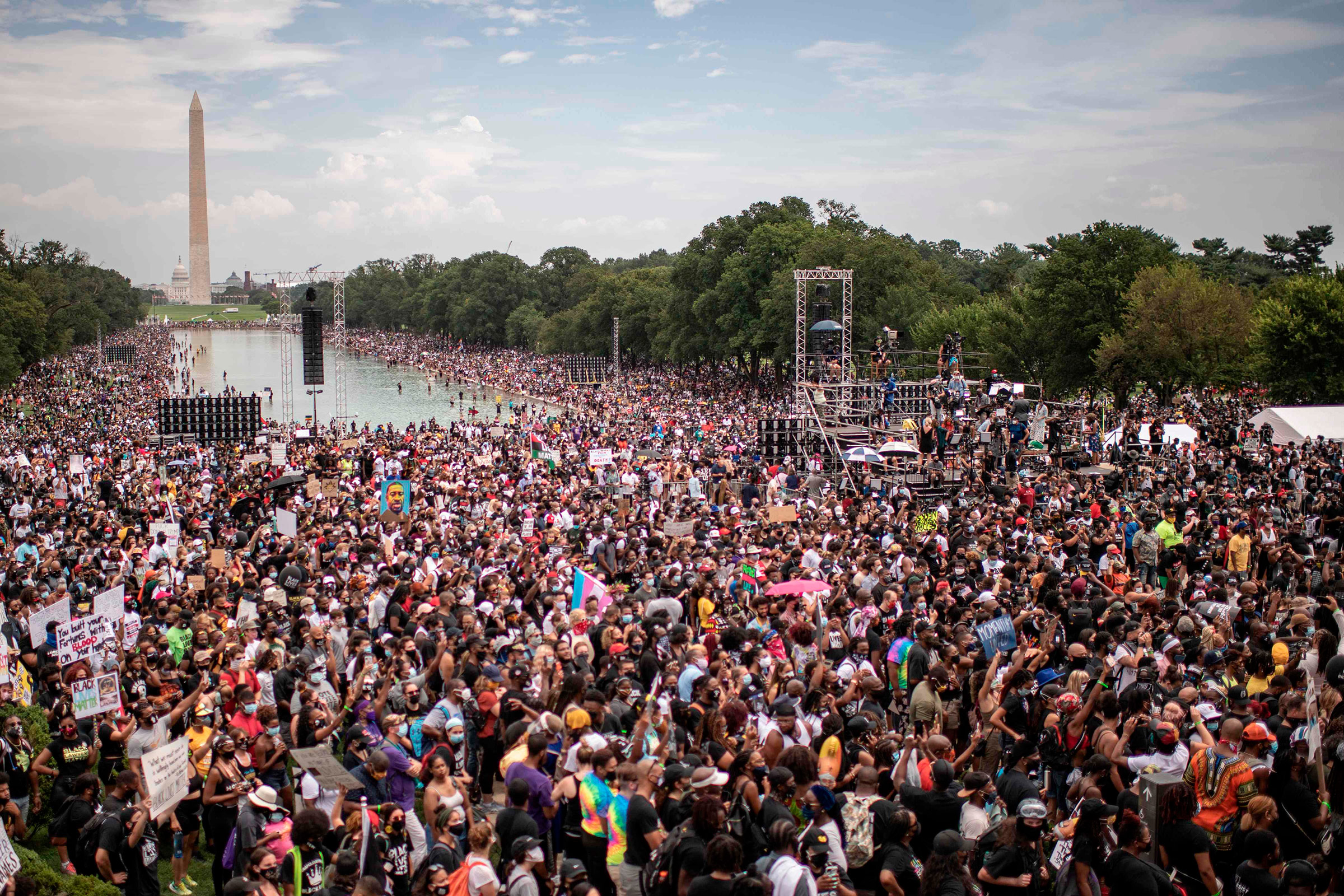 People attend the "Commitment March: Get Your Knee Off Our Necks" protest against racism and police brutality, at the Lincoln Memorial in Washington, D.C., on Aug. 28, 2020.