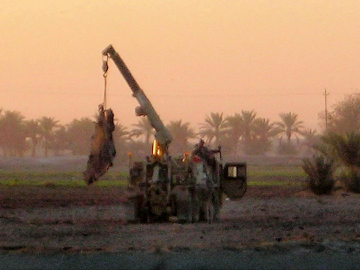 U.S. soldiers and Marines spent days protecting the crash scene and collecting remnants of Gilbert's F-16.