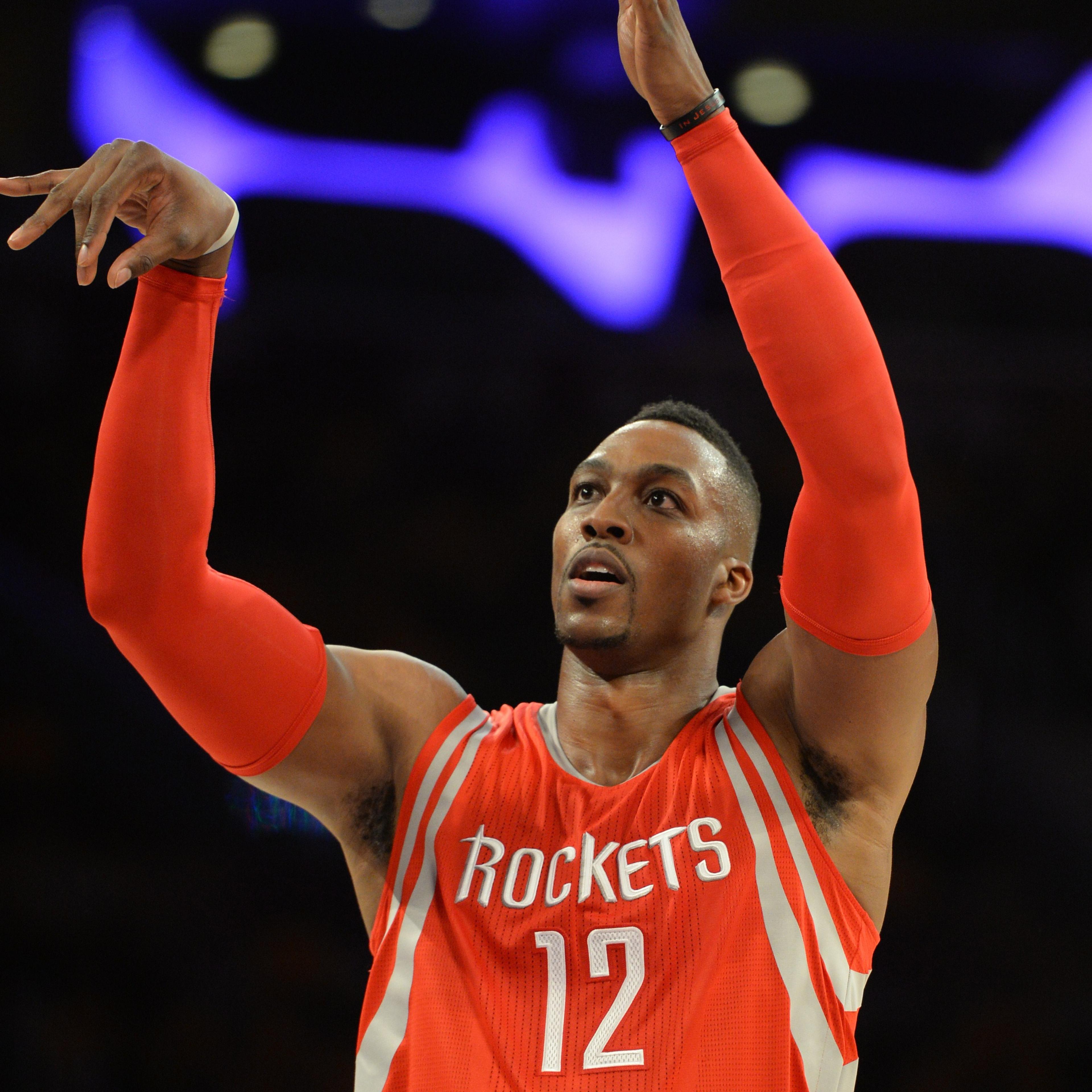 Dwight Howard of the Houston Rockets shoots from the free throw line during the Los Angeles Lakers first regular season NBA game against the Rockets on Oct. 28, 2014 at Staples Center in Los Angeles.