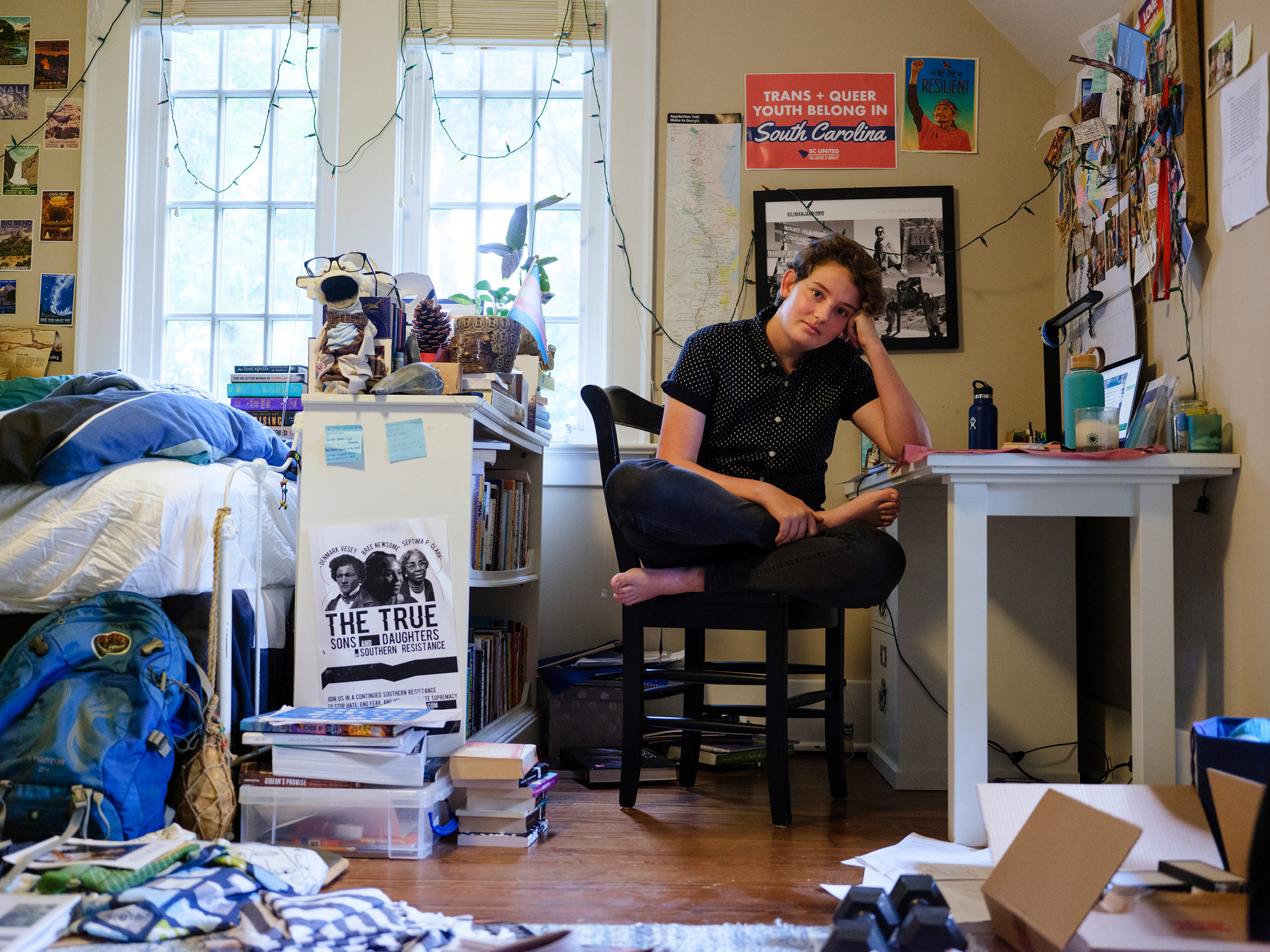 Eli, 18, sits in their room in Charleston, S.C., shortly after appearing on a panel on how to best treat and interact with trans youth at the Medical University of South Carolina. They were the only trans young person on the panel.