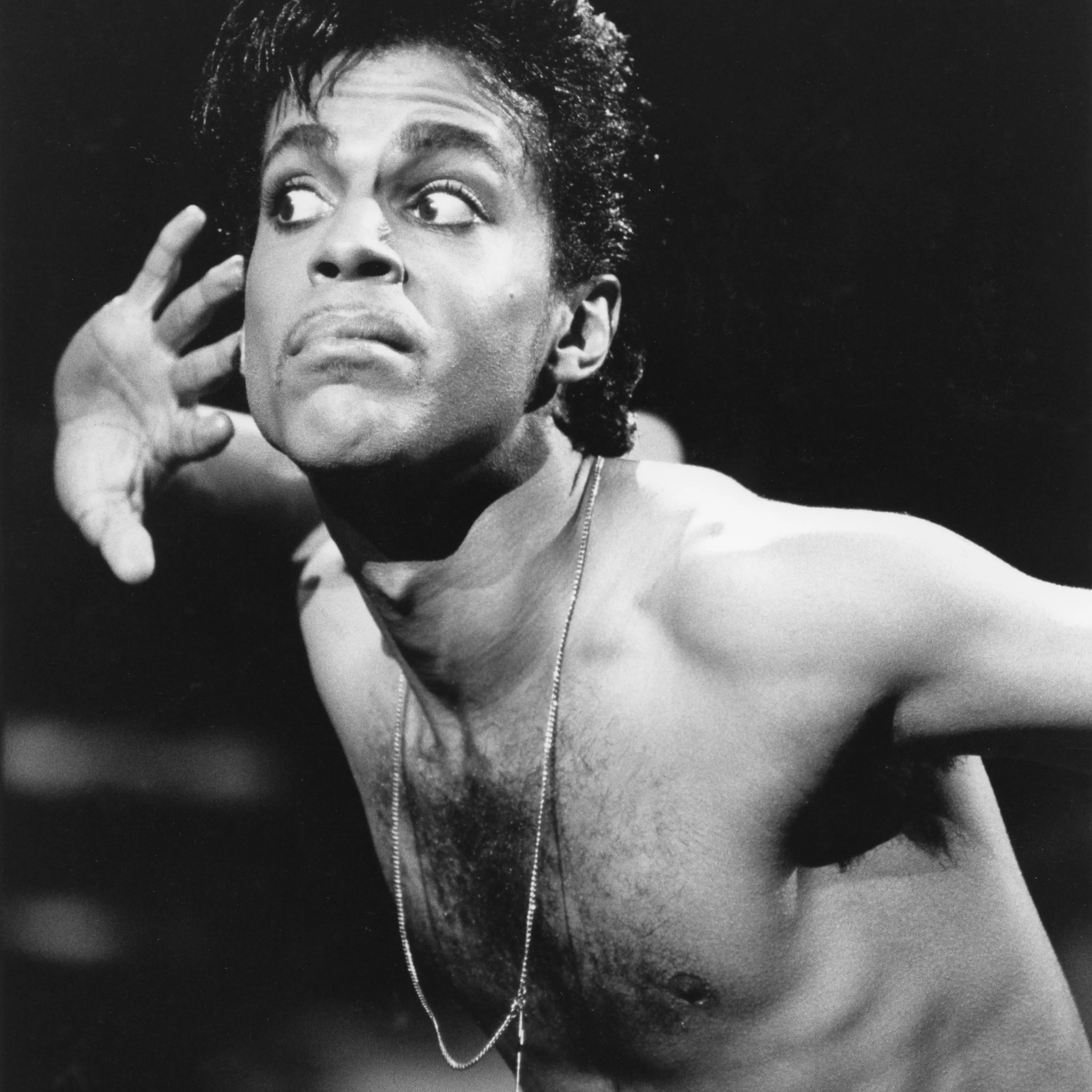 American musician Prince (1958 - 2016) performs onstage during a pre-tour concert at the Wiltern Theatre, Los Angeles, California, May 30, 1986