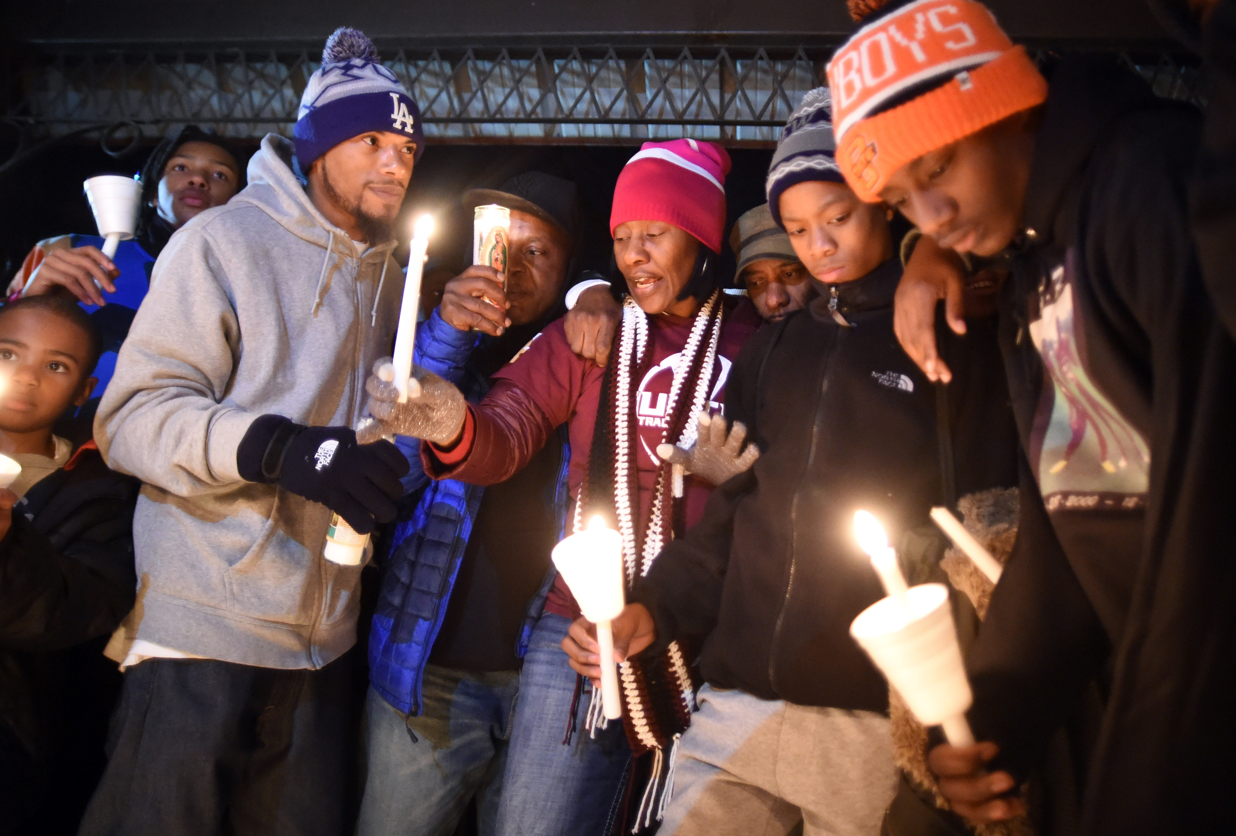Zenobia Dobson, center, speaks during a candlelight vigil for her slain son, Zaevion Dobson, at Sam E. Hill Park in Knoxville, Tenn., on Dec. 18, 2015.