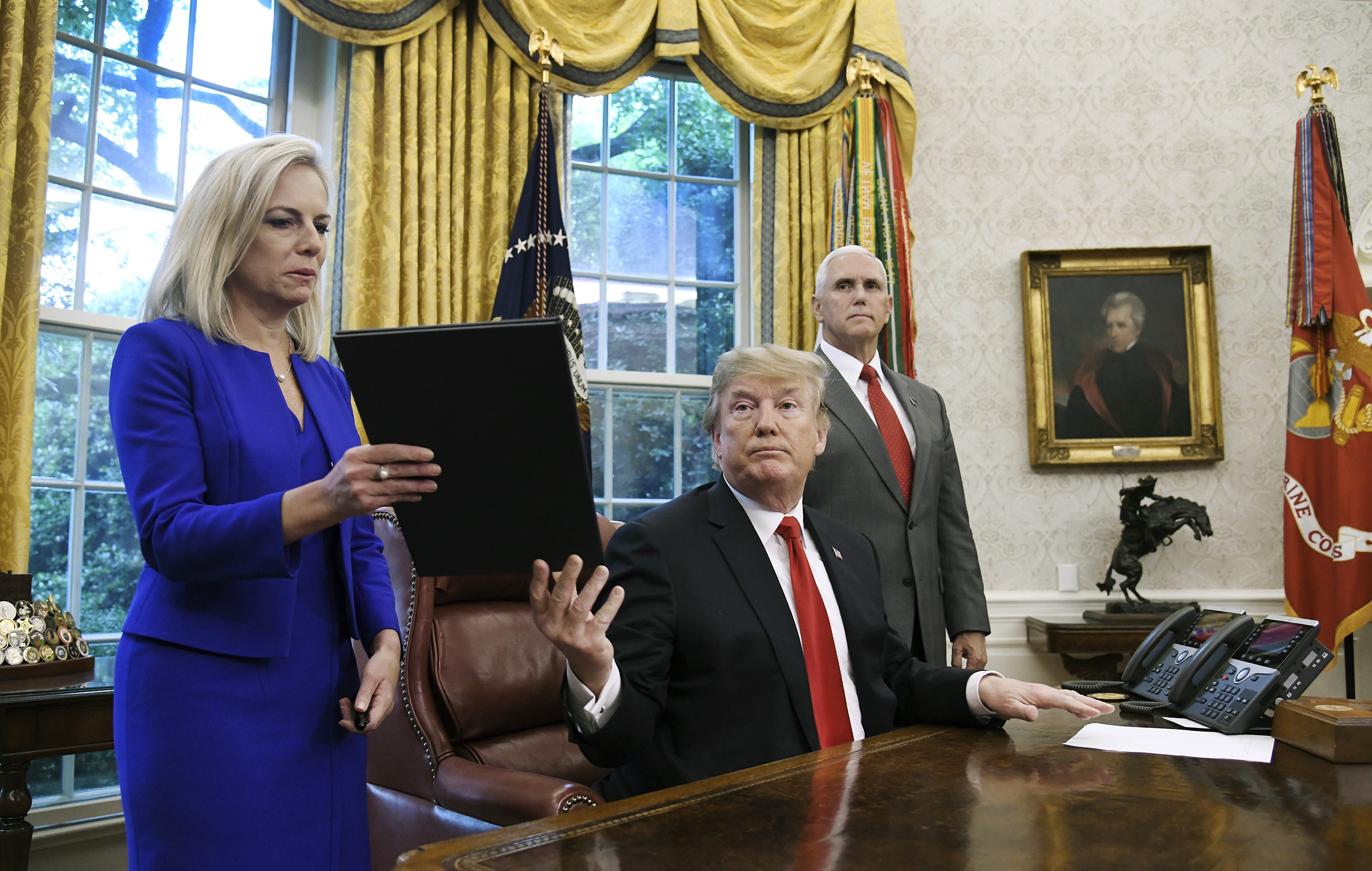 President Donald Trump signs executive order ending child-parent