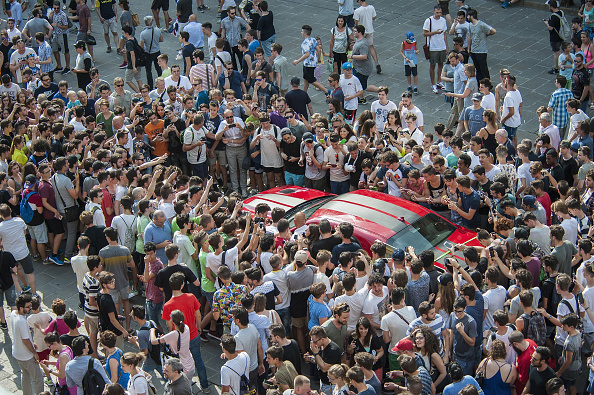 People attend during the arrival of Jeremy Clarkson, Richard Hammond and James May at Piazza dei Signori for their new Amazon TV Programme 'The Grand Tour ' on July 7, 2016 in Vicenza, Italy.