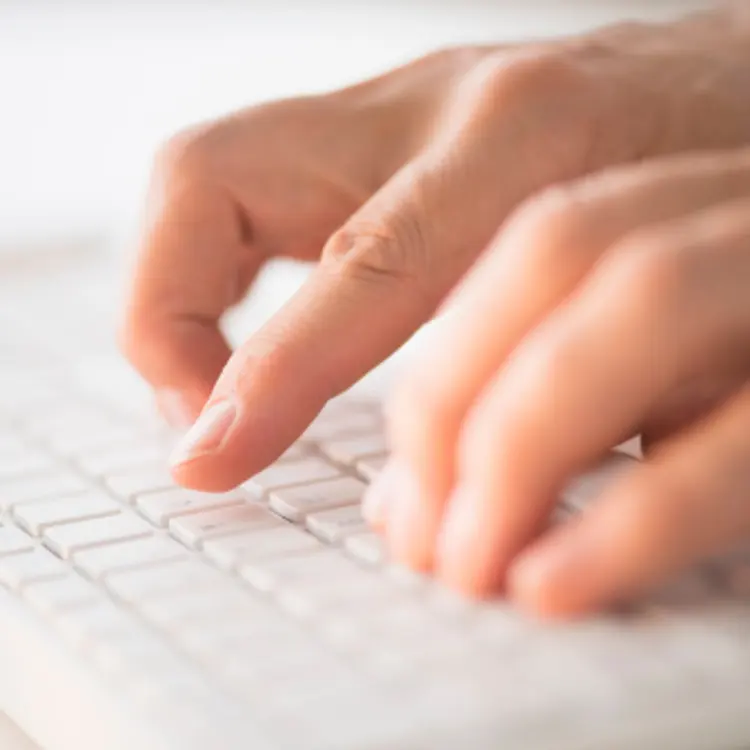 close-up-hands-typing-keyboard