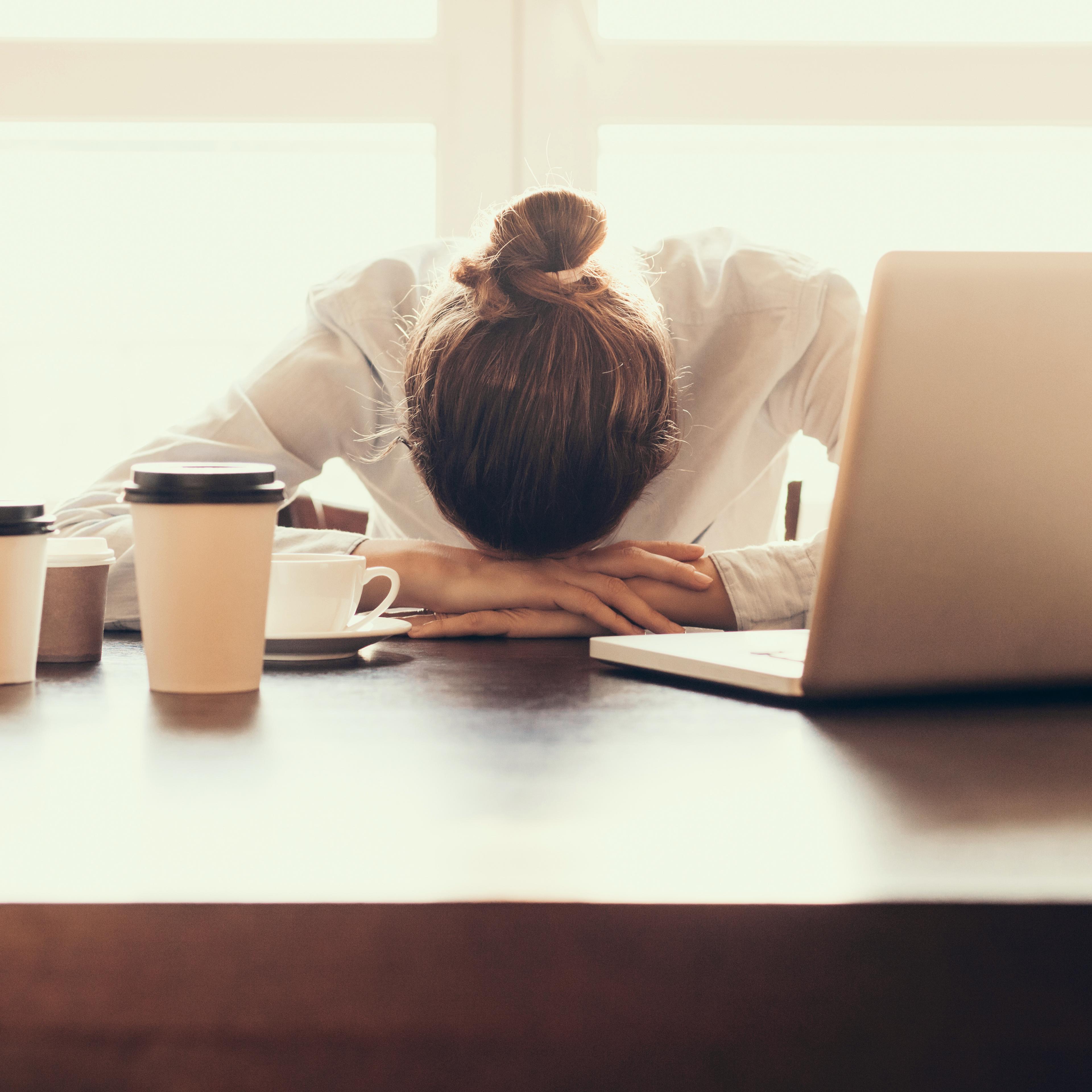 Tired woman in the office