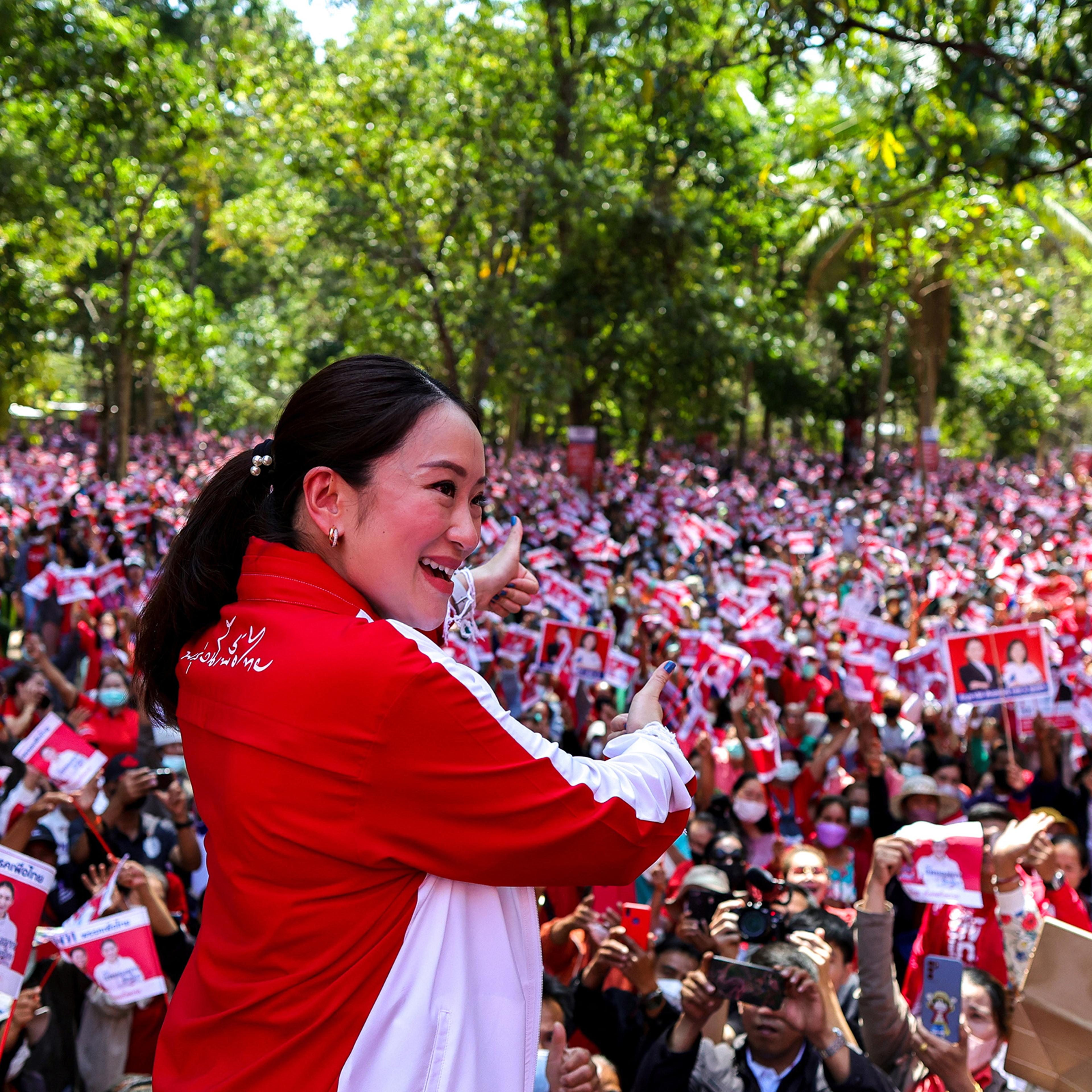 Paetongtarn Shinawatra, 36, the Pheu Thai Party's most visible candidate for prime minister, greets supporters during the general election campaign at a temple in Ubon Ratchathani province, Thailand, on Feb. 17.