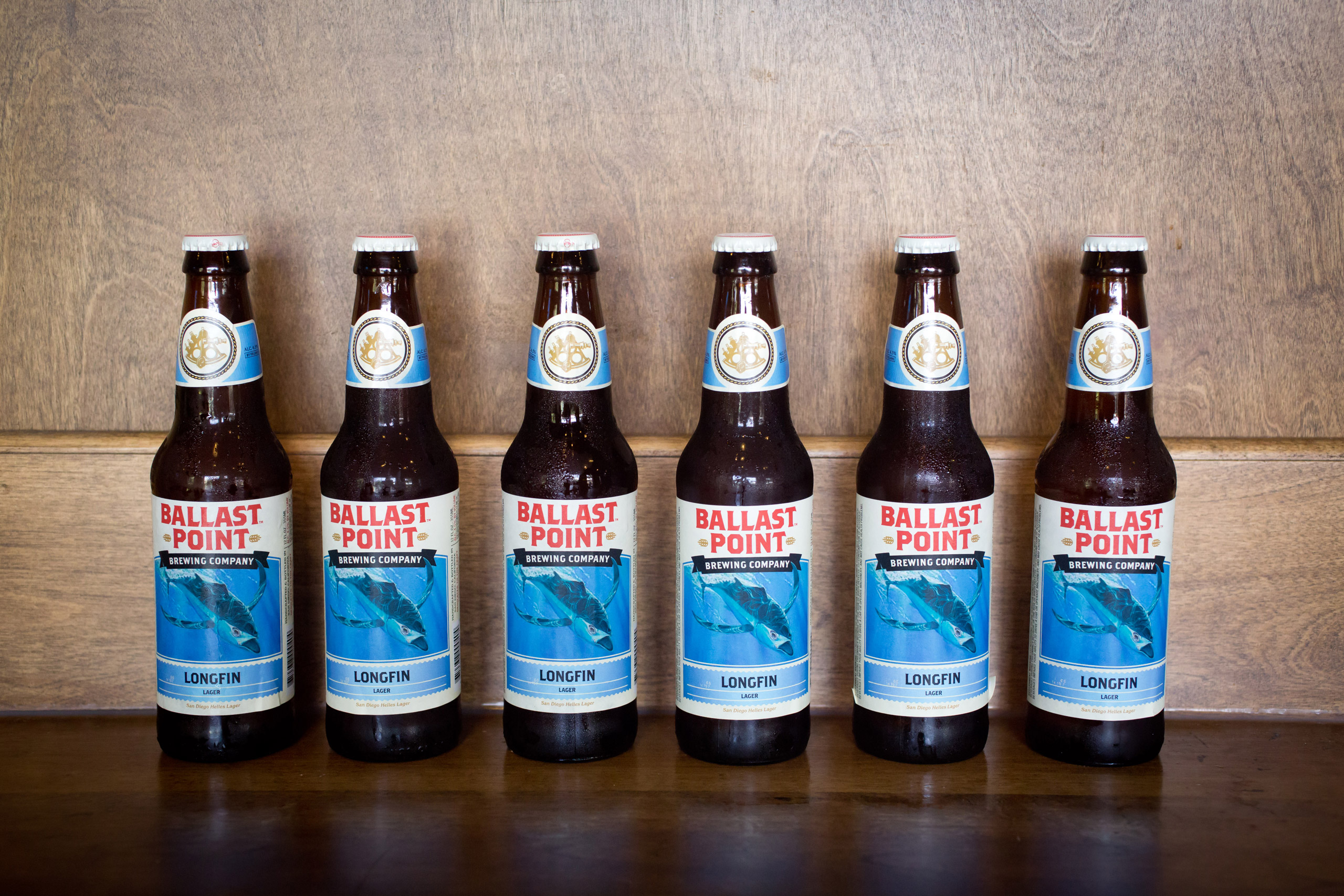 25 Aug 2014, San Diego, California, USA --- Bottles with Longfin Lager, Helles Lager in tasting room of the Ballast Point Brewing Company, a micro brewery in San Diego, in August 2014. --- Image by © Frank Duenzl/dpa/Corbis