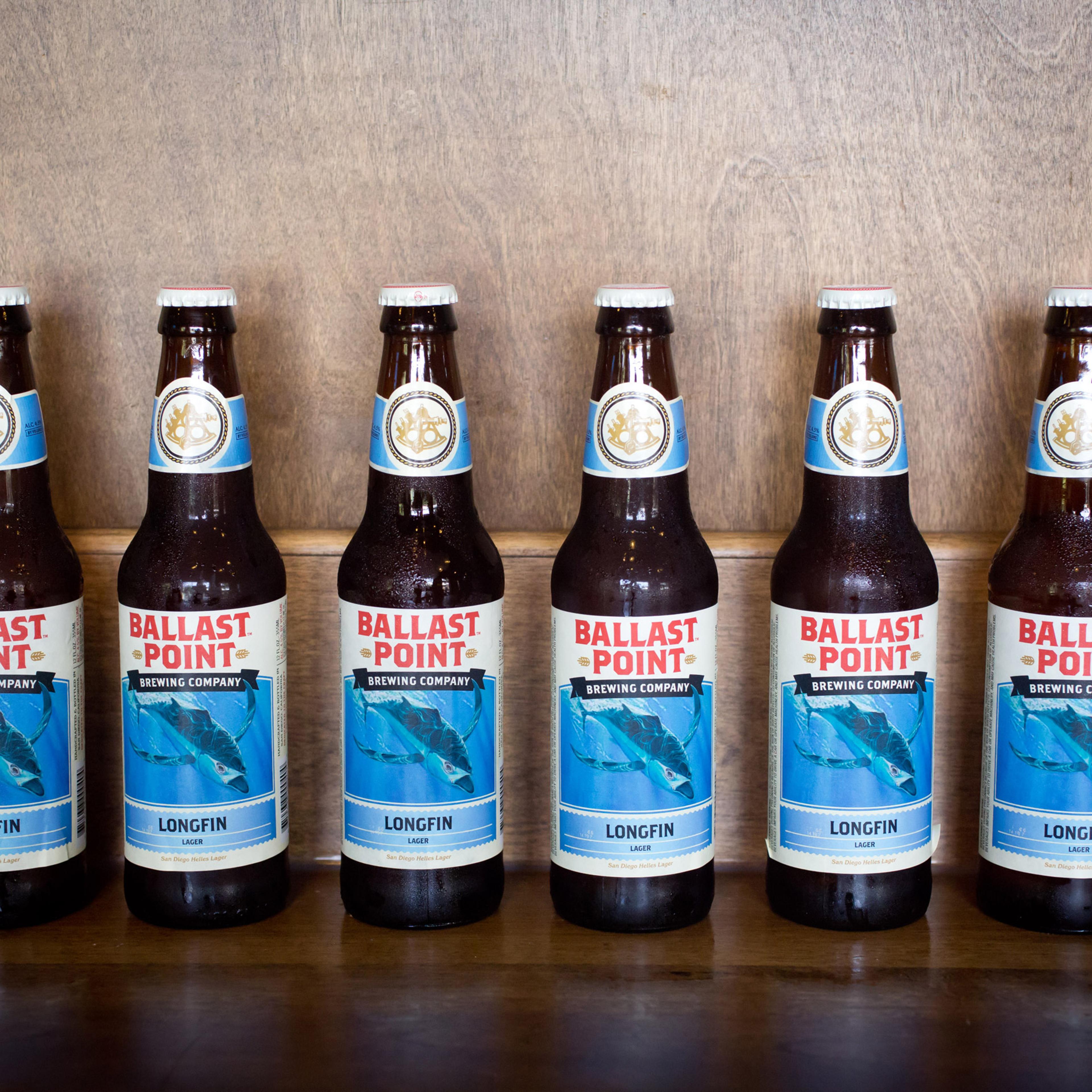 25 Aug 2014, San Diego, California, USA --- Bottles with Longfin Lager, Helles Lager in tasting room of the Ballast Point Brewing Company, a micro brewery in San Diego, in August 2014. --- Image by © Frank Duenzl/dpa/Corbis