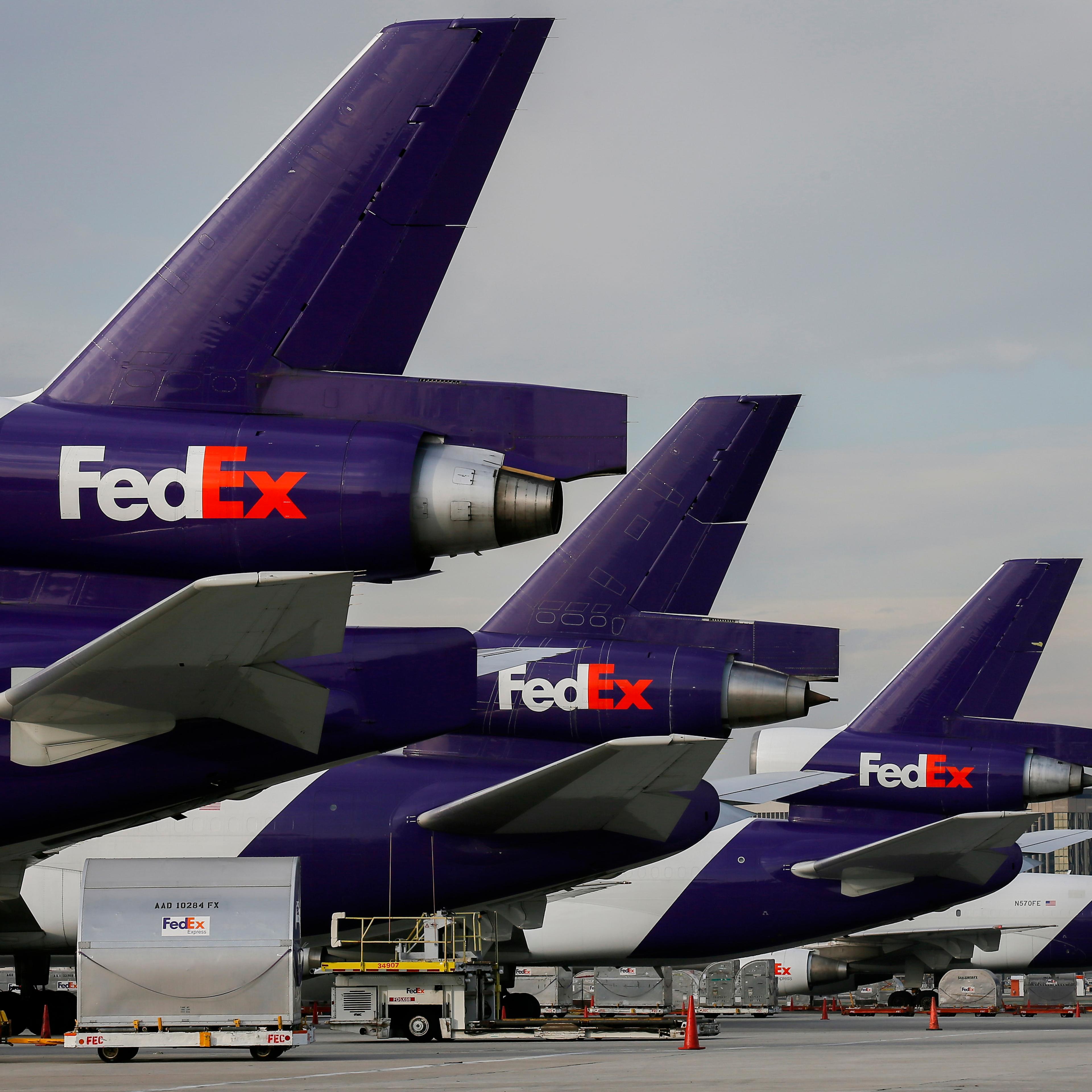 FedEx Corp. aircraft await at Los Angeles International Airport in Los Angeles on Dec. 15, 2014.
