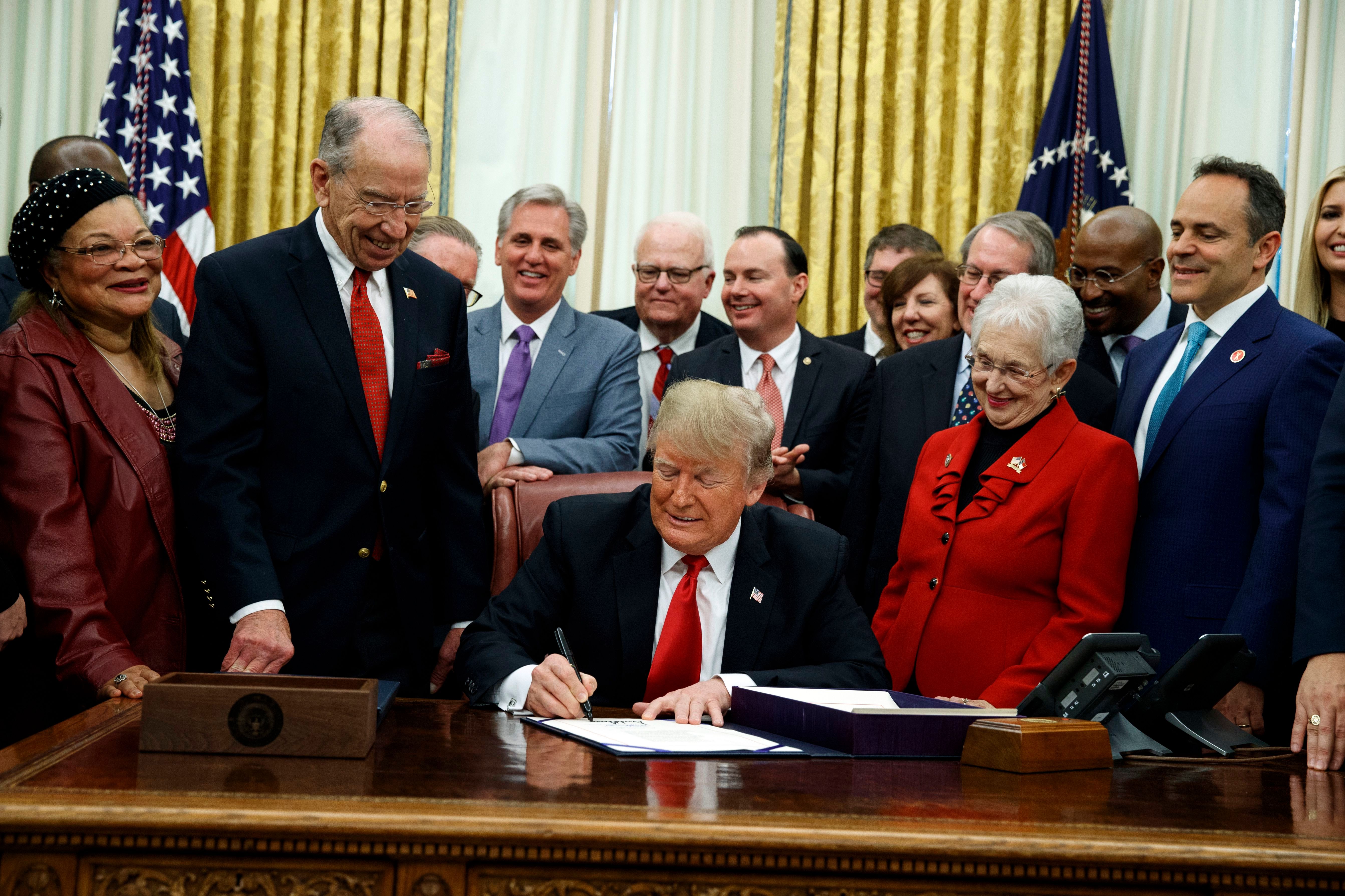 President Donald Trump signs criminal justice reform legislation