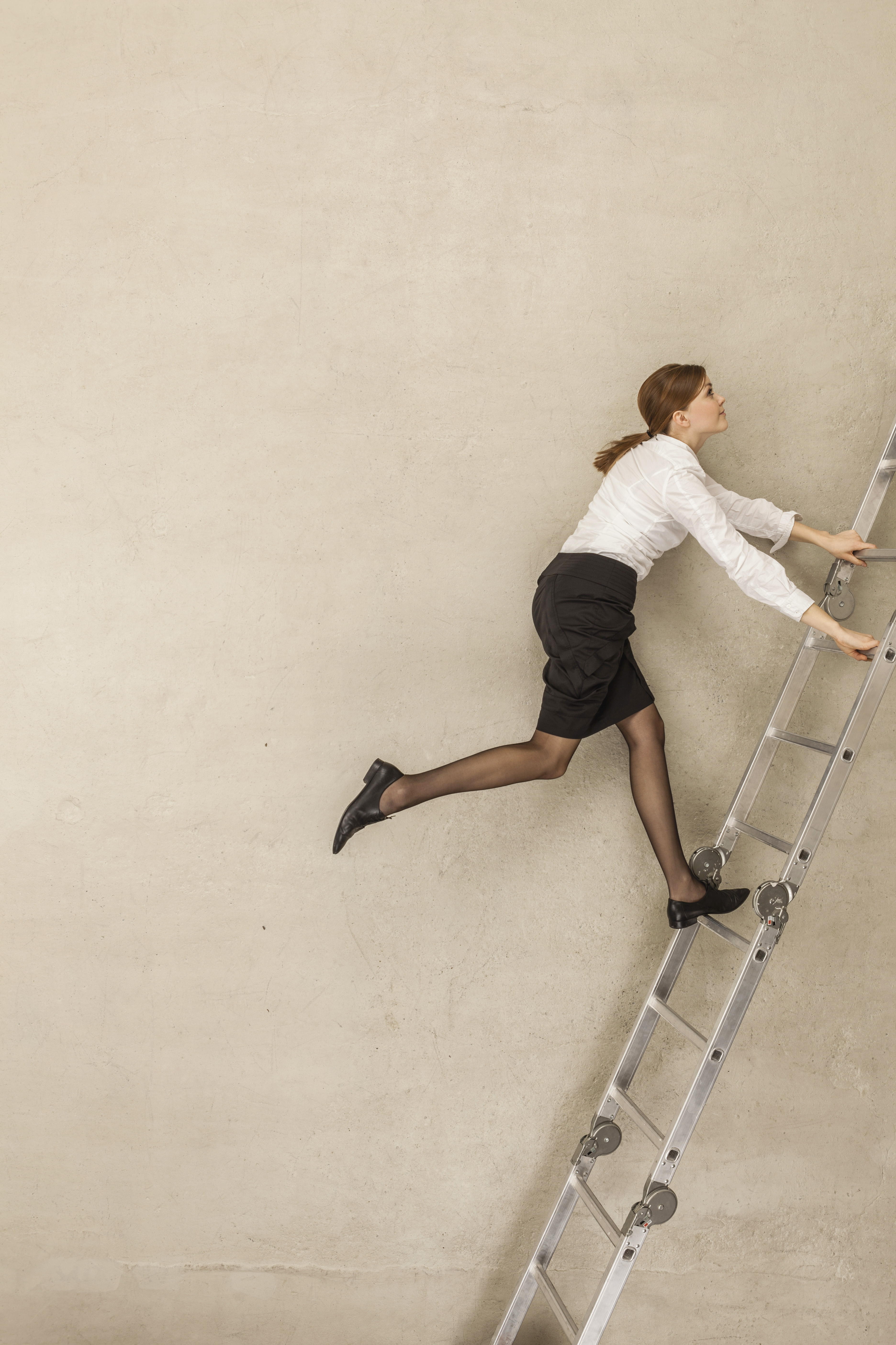 woman-climbing-up-ladder