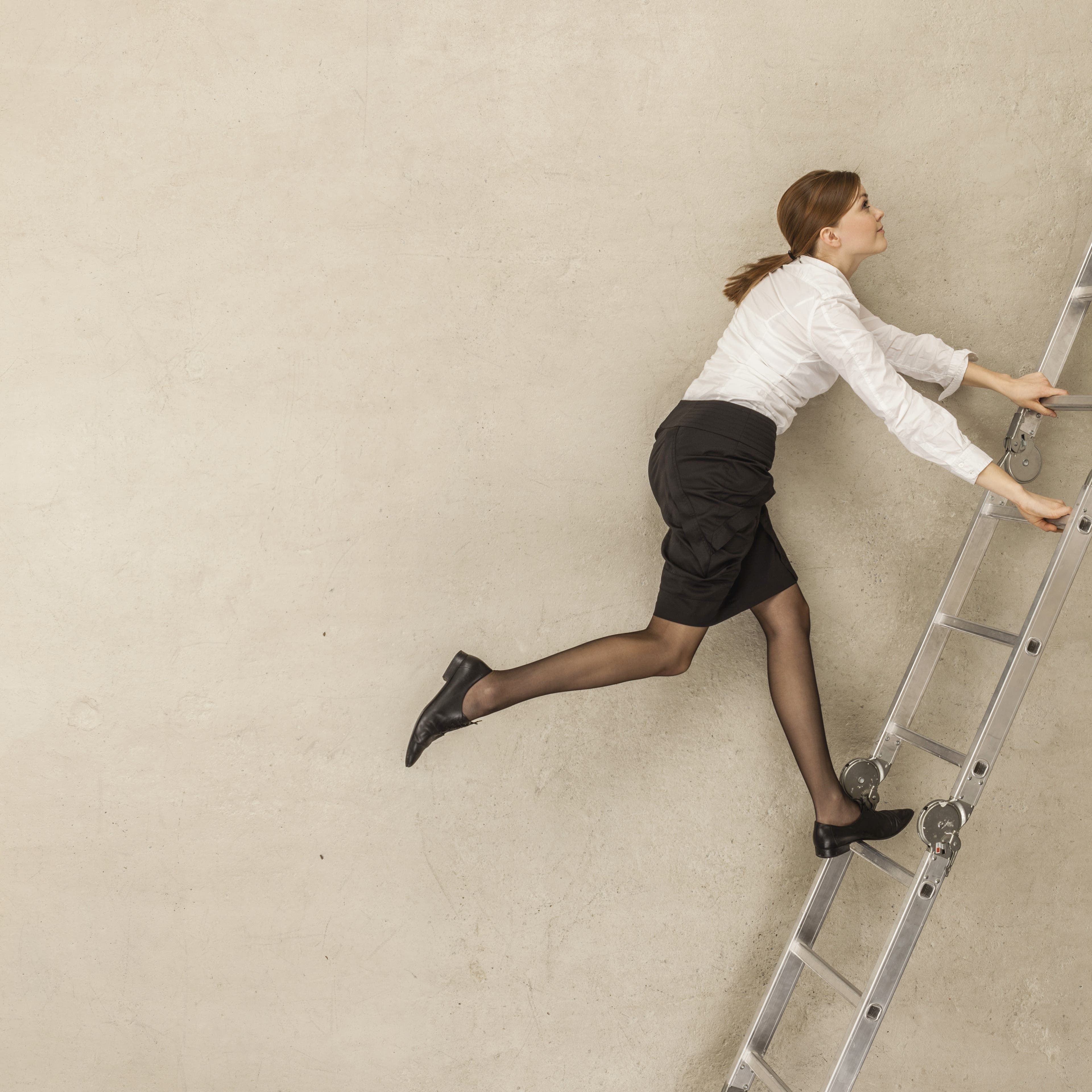 woman-climbing-up-ladder