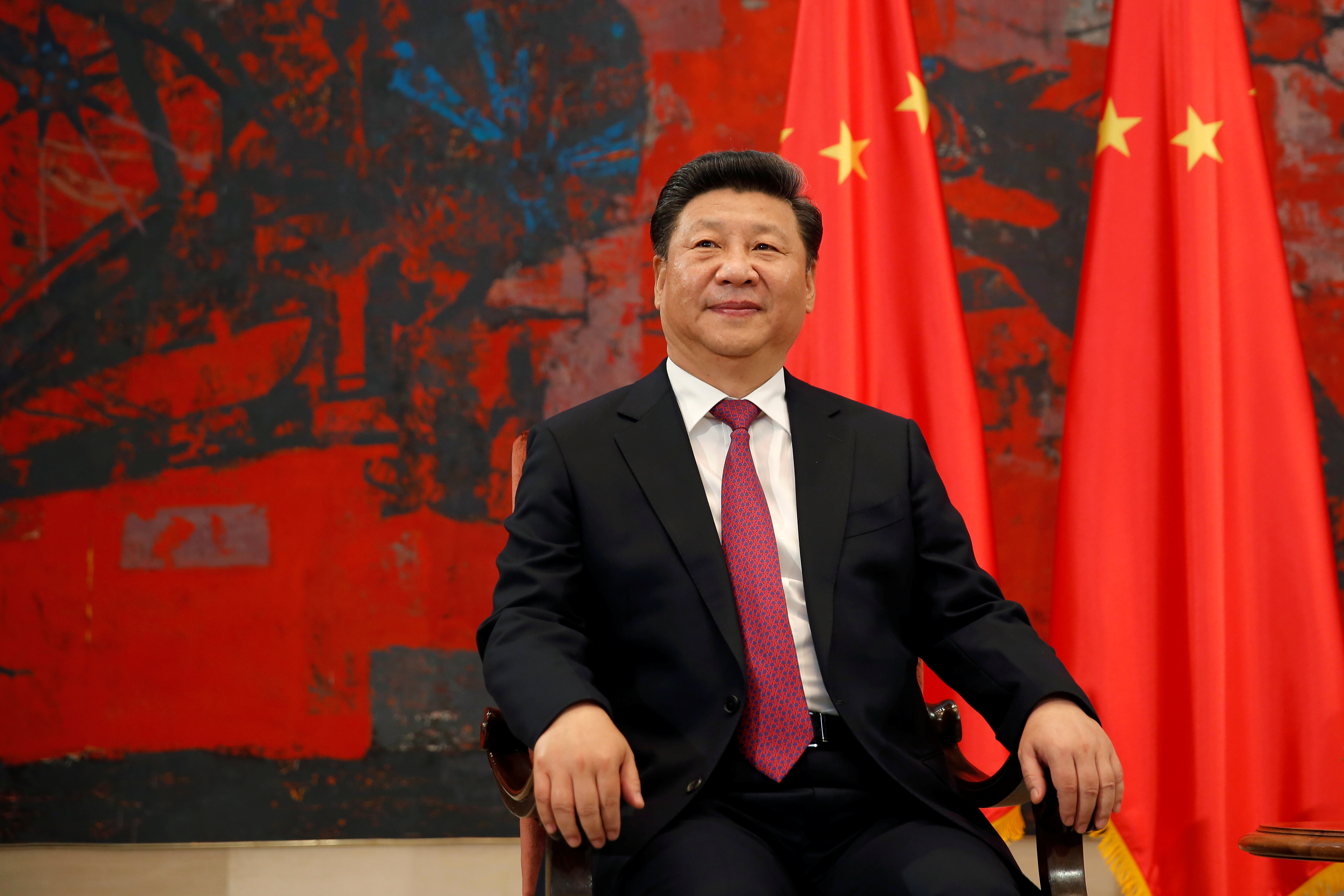 Chinese President Xi Jinping looks on during a meeting with his Serbian counterpart Tomislav Nikolic in Belgrade