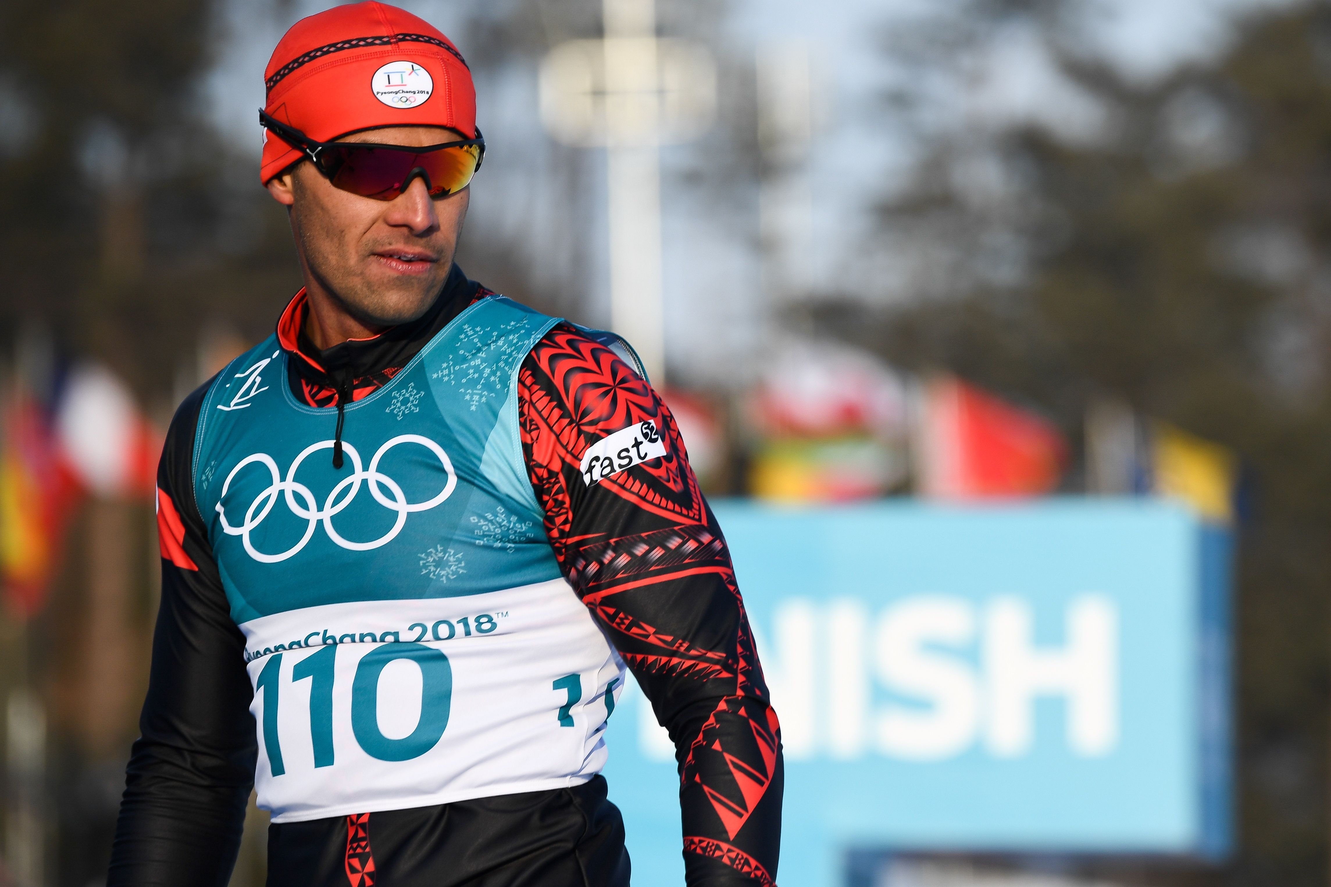 Tonga's Pita Taufatofua finishes the 15km cross country freestyle race in PyeongChang