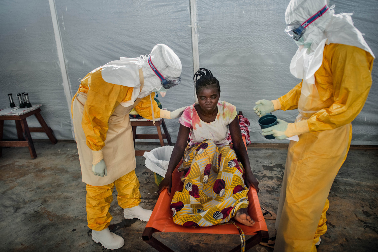 Sylvain Cherkaoui, April 19, 2014. Gueckedou, Guinea."Doctors Without Borders sent me to Guekedou Forest in Guinea to cover the current Ebola crisis. After receiving an alert a team of doctors went to look for a woman who was exhibiting symptoms of the E