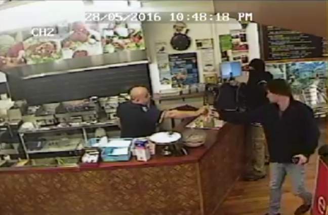 Take-Out Owner Prevents Robbery By Ignoring Armed Thief