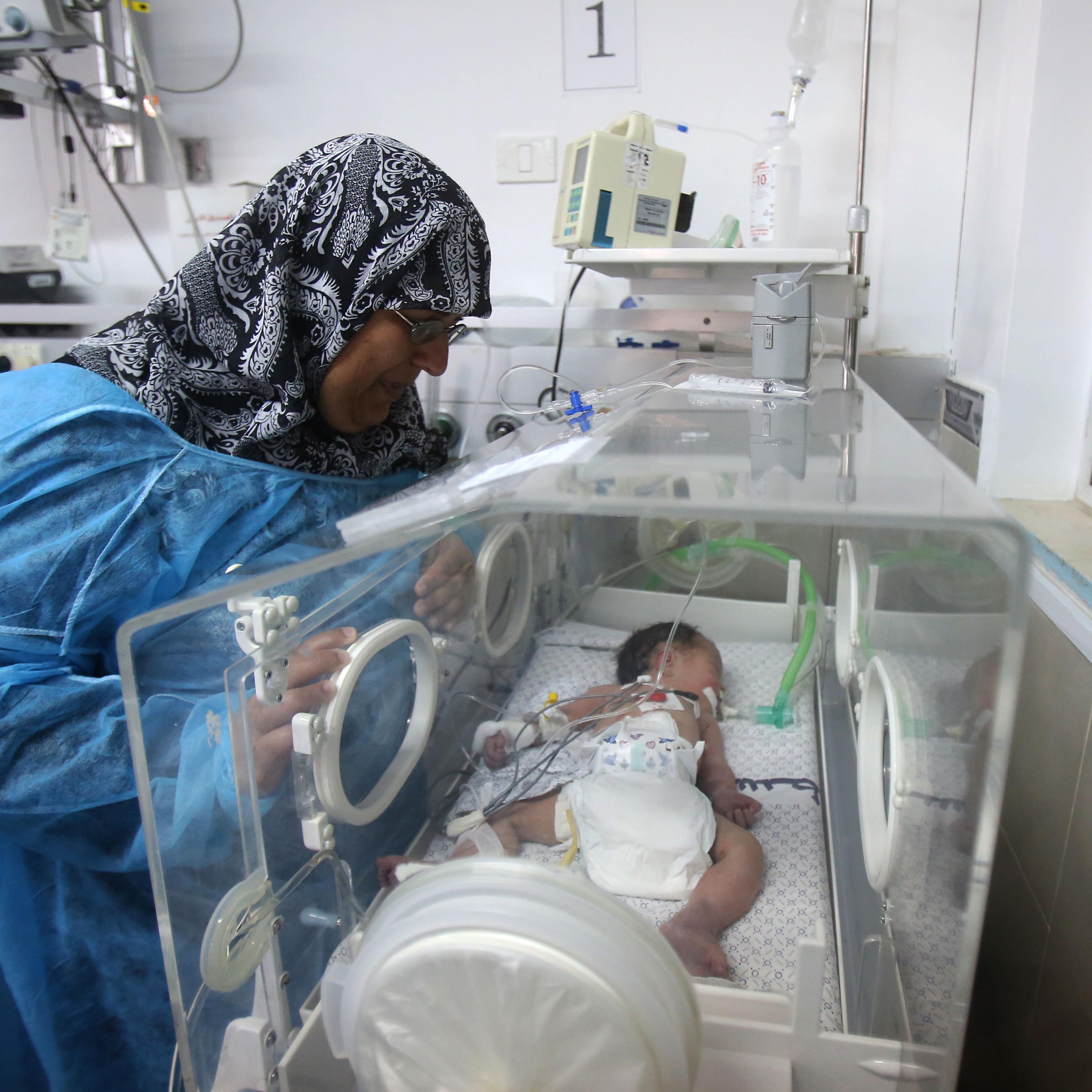 Gazain baby treated at health centre in Gaza