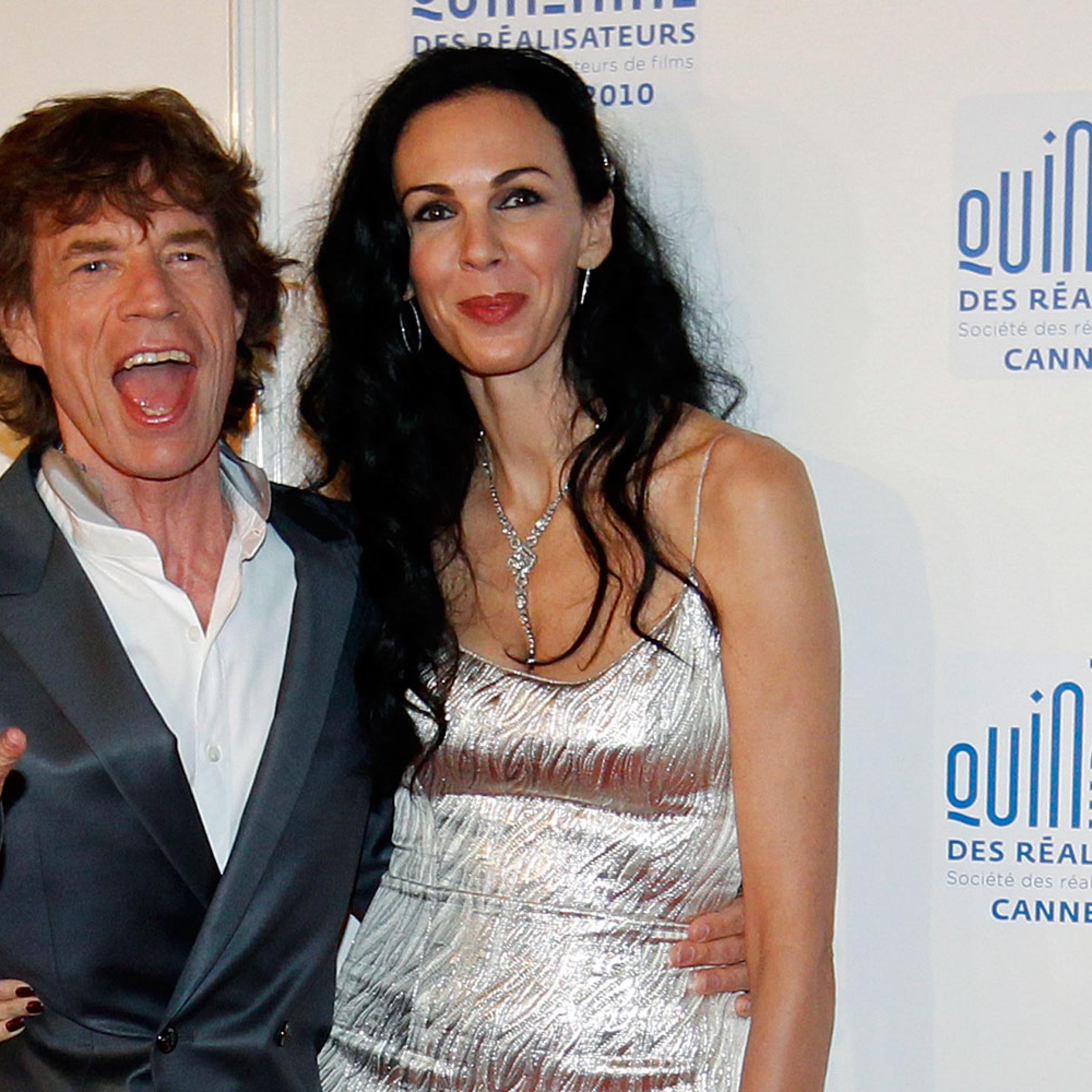 Rolling Stones lead singer Mick Jagger and fashion stylist L'Wren Scott arrive at the "Quinzaine des Realisateurs" at the 63rd Cannes Film Festival May 19, 2010.