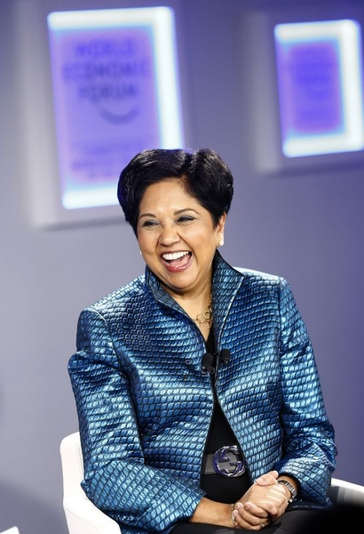 Nooyi Chairman and Chief Executive Officer of PepsiCo laughs during session of World Economic Forum in Davos