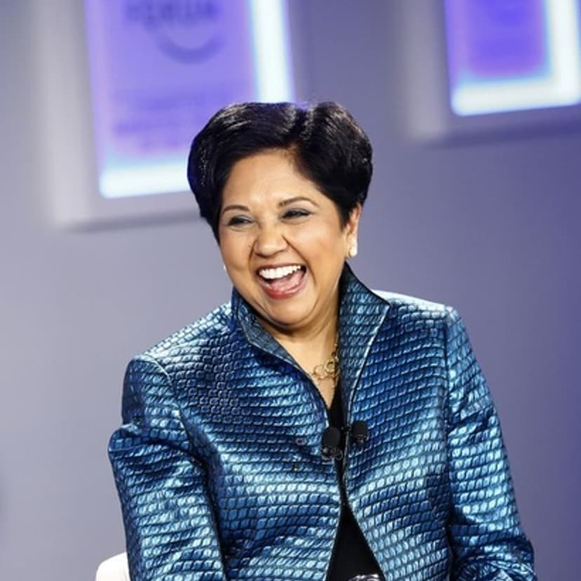 Nooyi Chairman and Chief Executive Officer of PepsiCo laughs during session of World Economic Forum in Davos