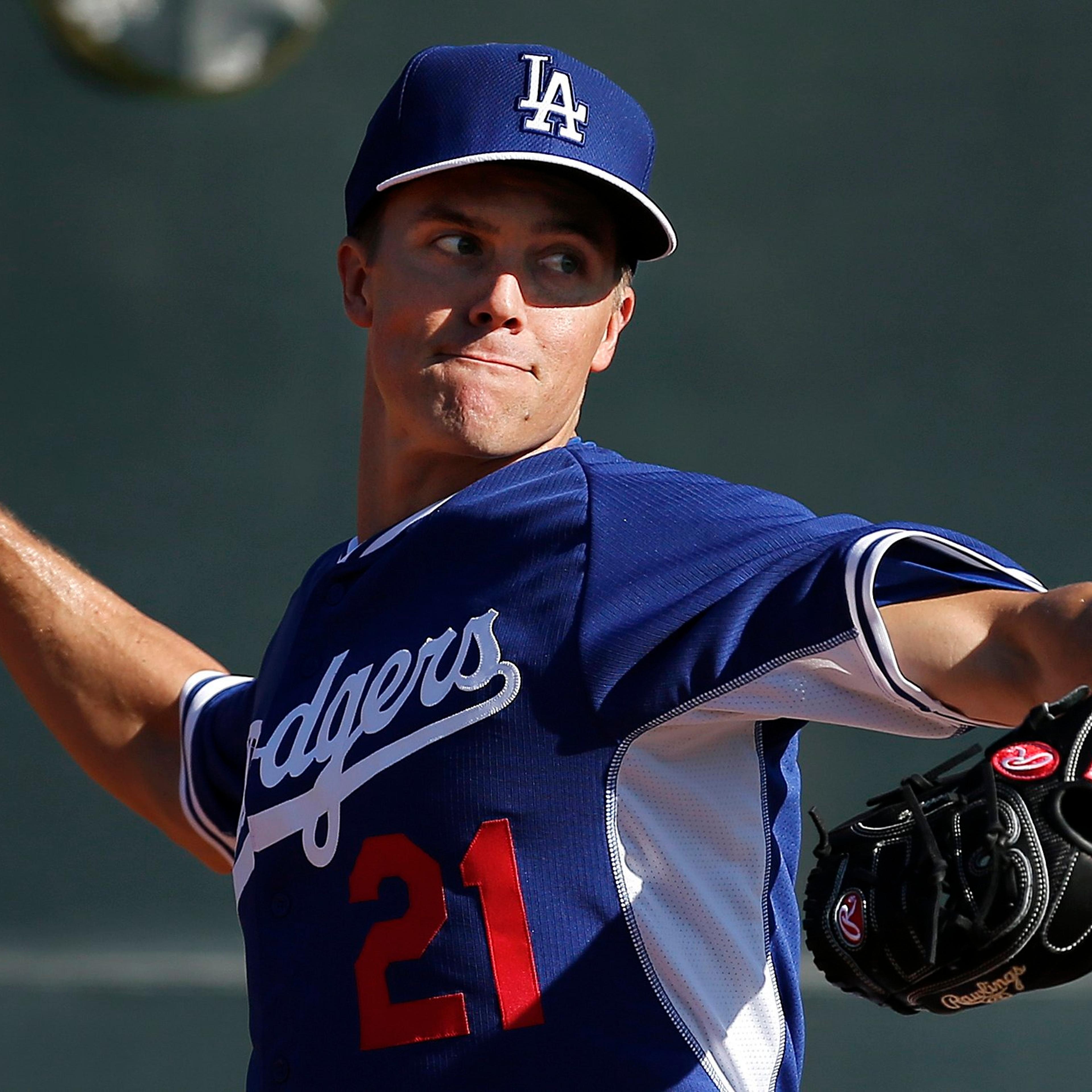 Los Angeles Dodgers pitcher Zack Greinke throws during spring training baseball practice in Glendale, Ariz.