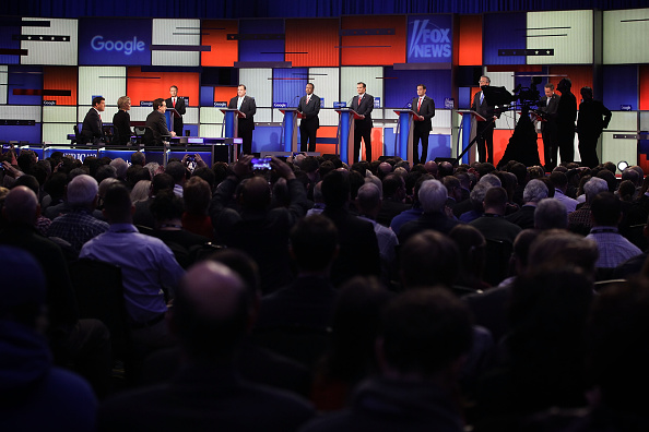 Republican presidential candidates (R-L) Ohio Governor John Kasich, Jeb Bush, Sen. Marco Rubio (R-FL), Sen. Ted Cruz (R-TX), Ben Carson, New Jersey Governor Chris Christie and Sen. Rand Paul (R-KY) wait for the beginning of the Fox News - Google GOP Deba