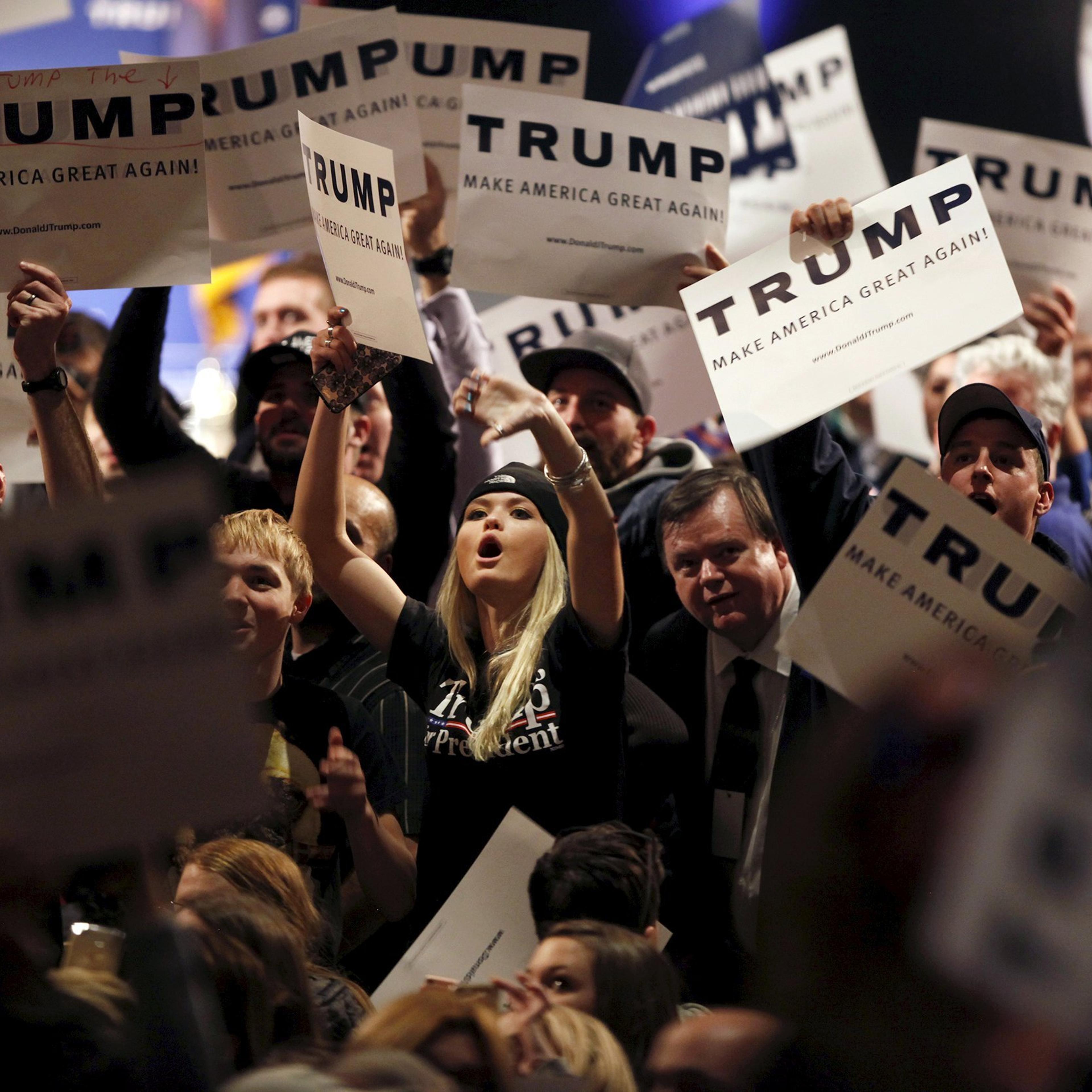 Supporters of U.S. Republican presidential candidate Donald Trump jeer at protesters during a campaign rally in Burlington, Vt. on Jan. 7, 2016.