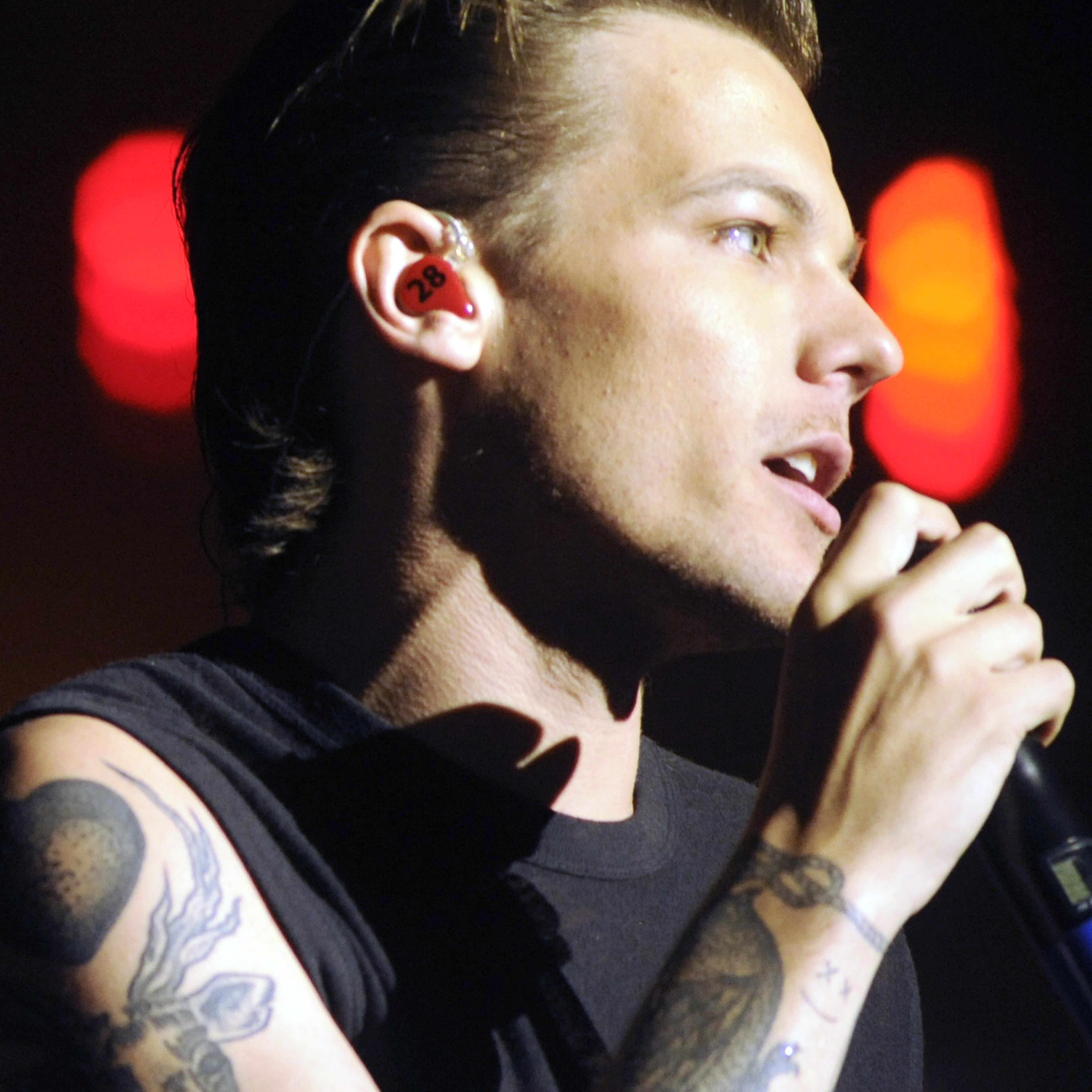 Louis Tomlinson of One Direction performs during the band's "On the Road Again" tour at Levi's Stadium on July 11, 2015 in Santa Clara, California.