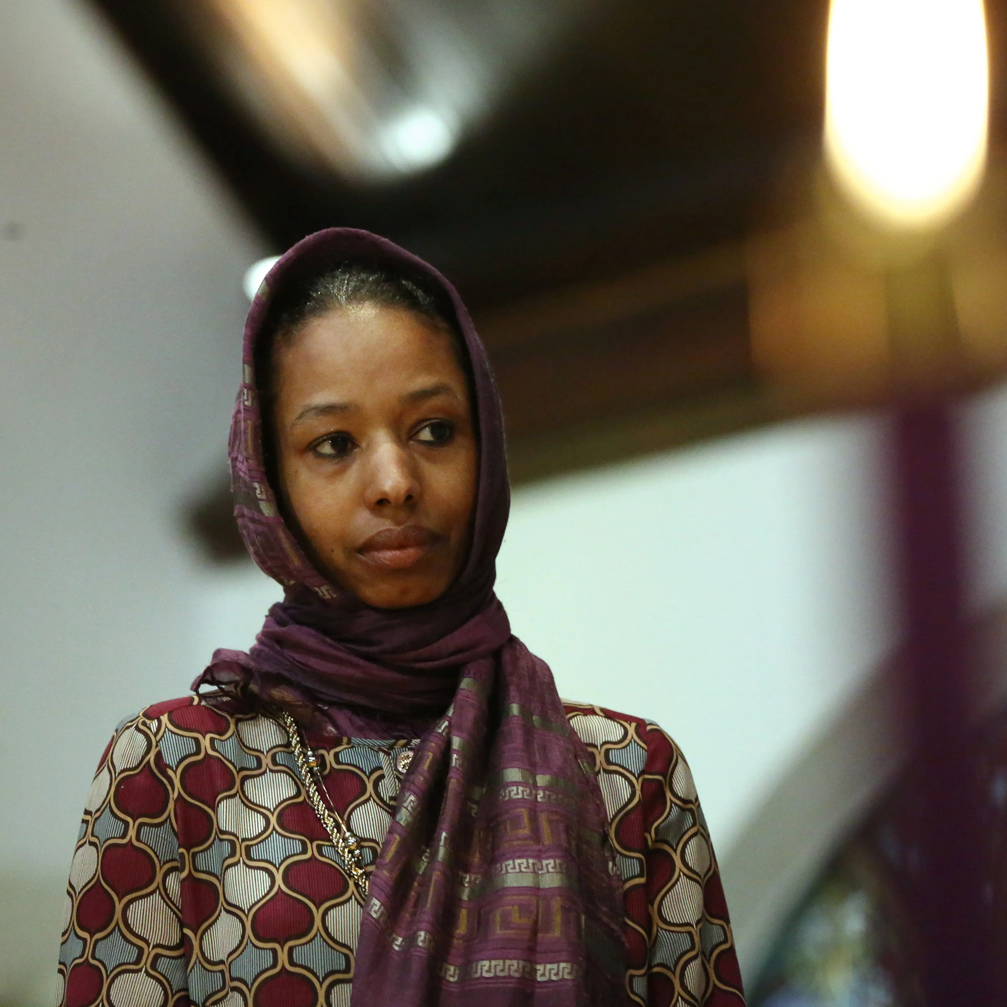 Larycia Hawkins, a Christian who is wearing a hijab over Advent in solidarity with Muslims, attends service at St. Martin Episcopal Church in Chicago on Sunday, Dec. 13, 2015.