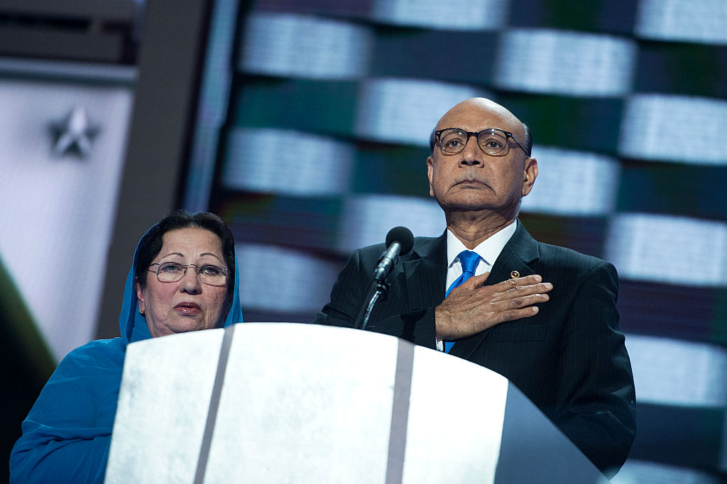 Khizr Khan and his wife, whose son, Army Capt. Humayun Khan was killed in Iraq, address the crowd at the Wells Fargo Center in Philadelphia, Pa., on the final night of the Democratic National Convention, July 28, 2016.