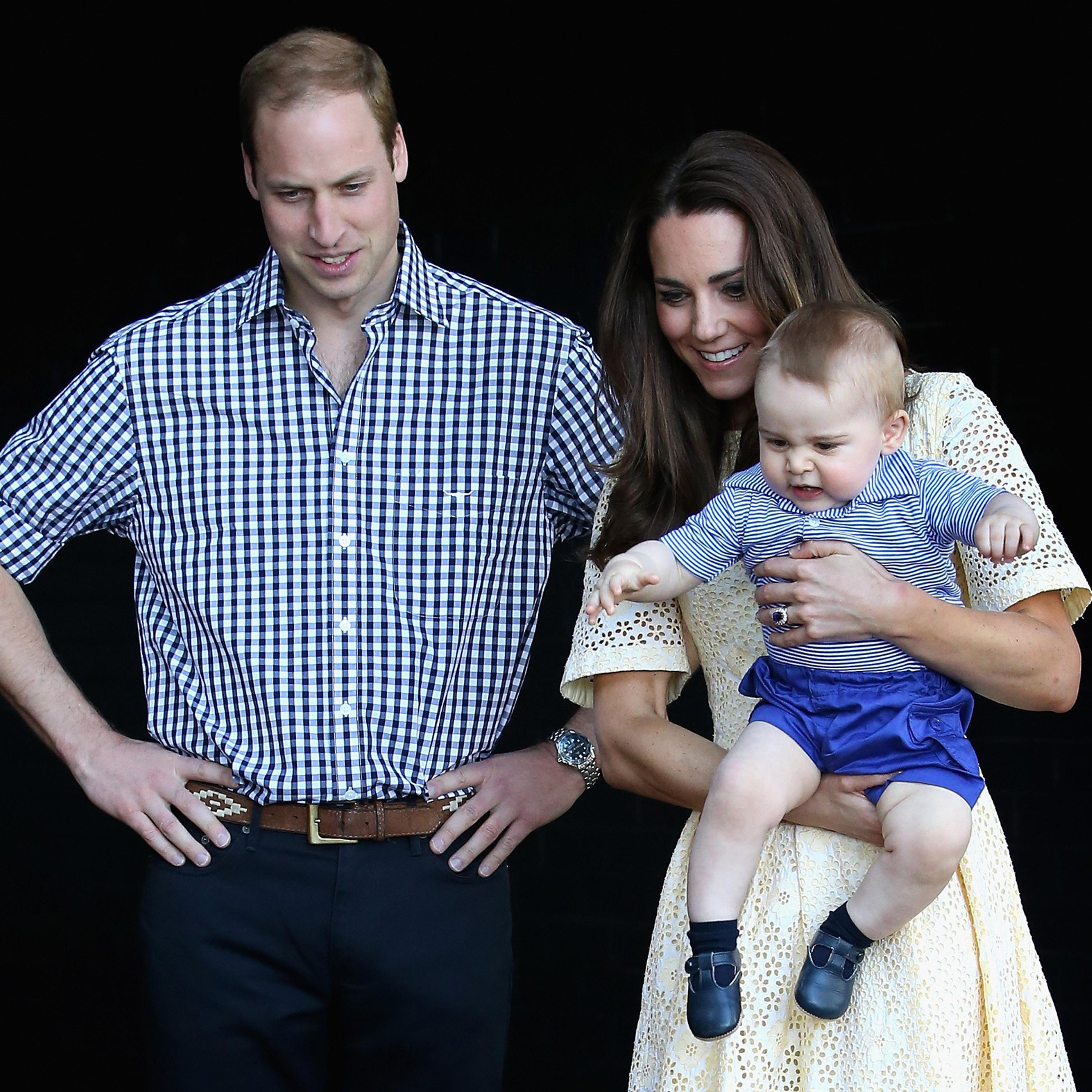 Catherine, Duchess of Cambridge holds Prince George of Cambridge as Prince William, Duke of Cambridge looks on at Taronga Zoo on April 20, 2014 in Sydney.