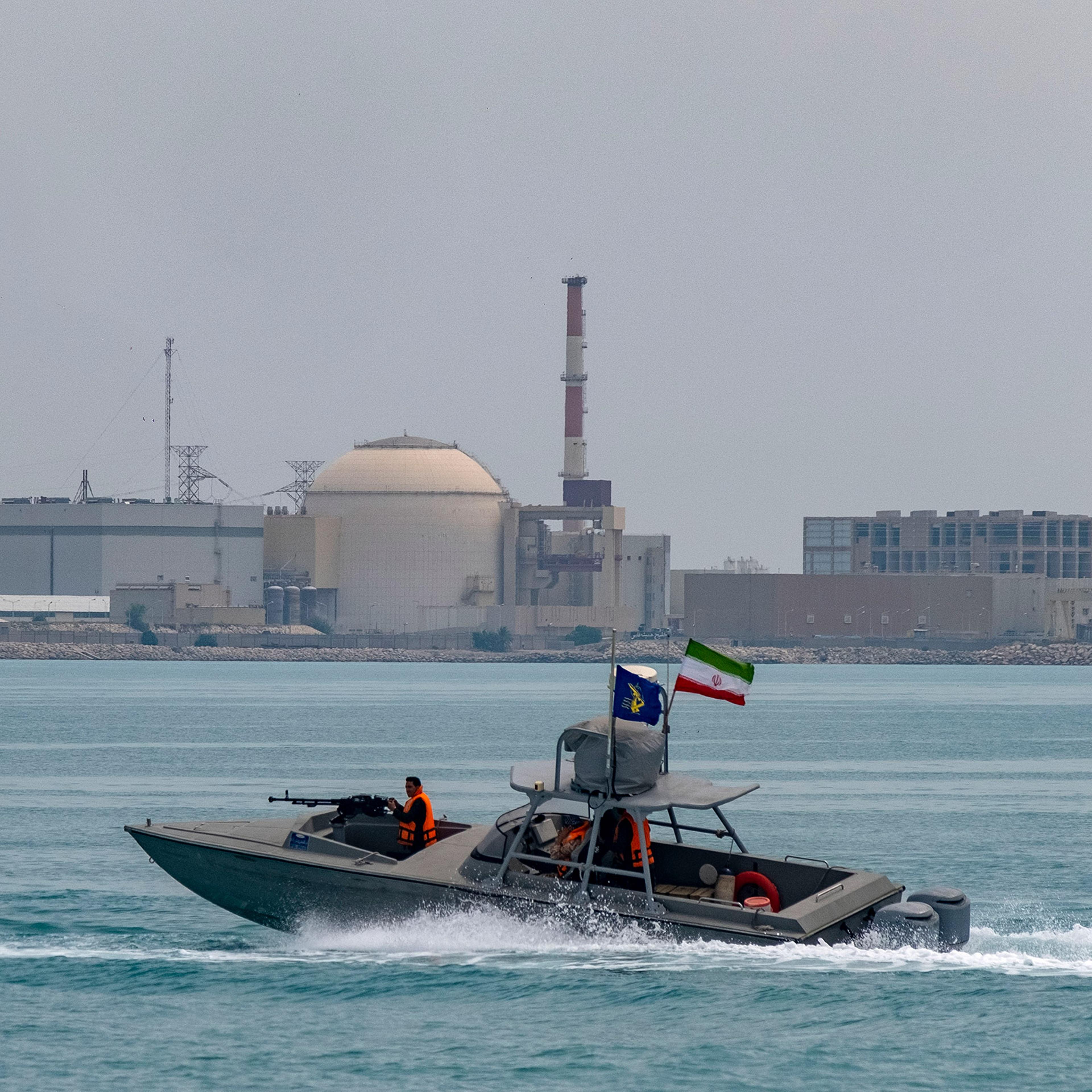 An Islamic Revolutionary Guard Corps speedboat sails near the Bushehr nuclear power plant in the south of Iran on April 29, 2024.
