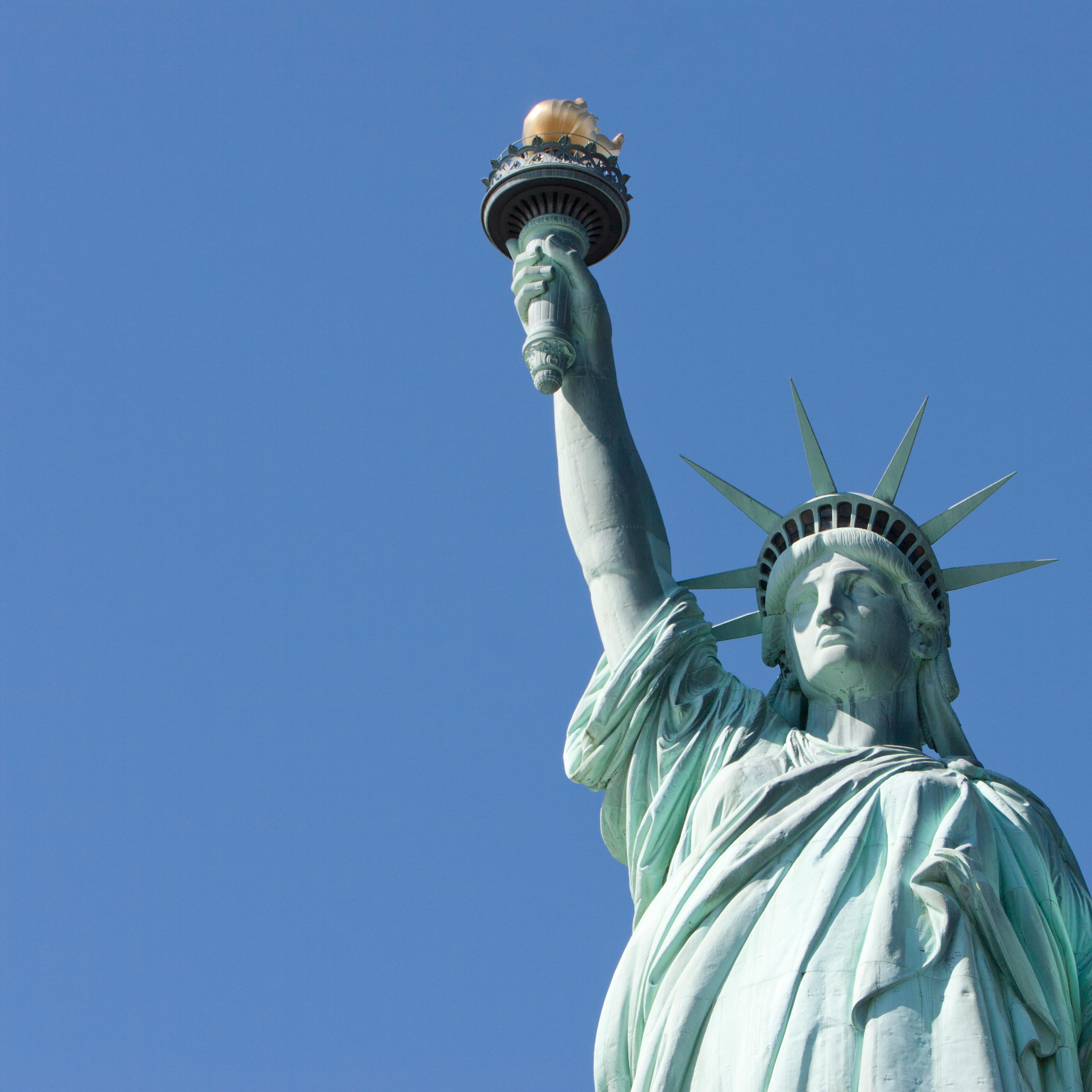 Statue of Liberty on a blue sky day