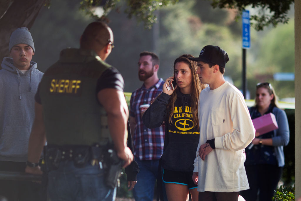People arrive to a family assistance and reunification center following a mass shooting at the Borderline Bar and Grill after Thousand Oaks Shooting