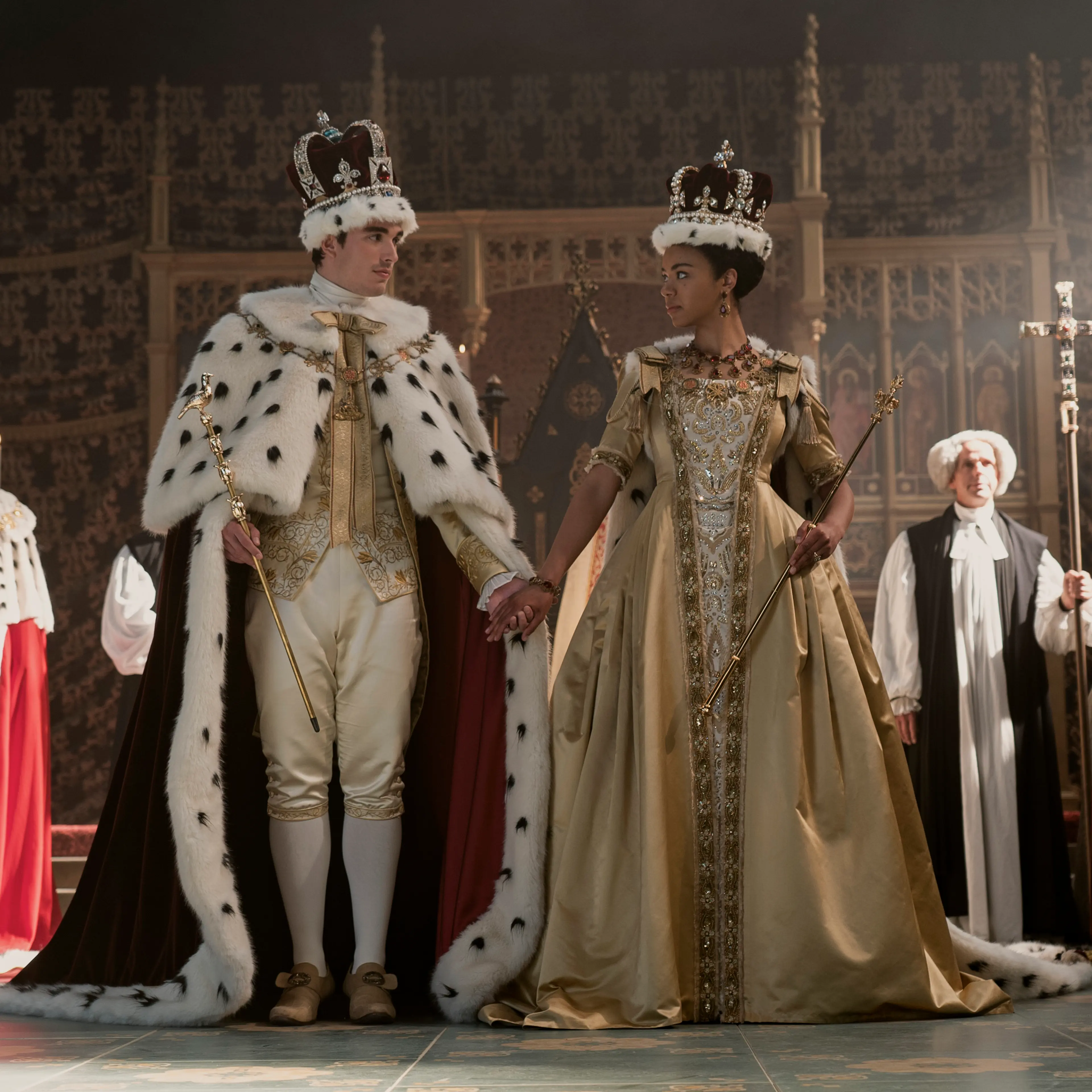 Queen Charlotte: A Bridgerton Story. (L to R) Corey Mylchreest as Young King George, India Amarteifio as Young Queen Charlotte, Michelle Fairley as Princess Augusta in episode 103 of Queen Charlotte: A Bridgerton Story. Cr. Liam Daniel/Netflix © 2023