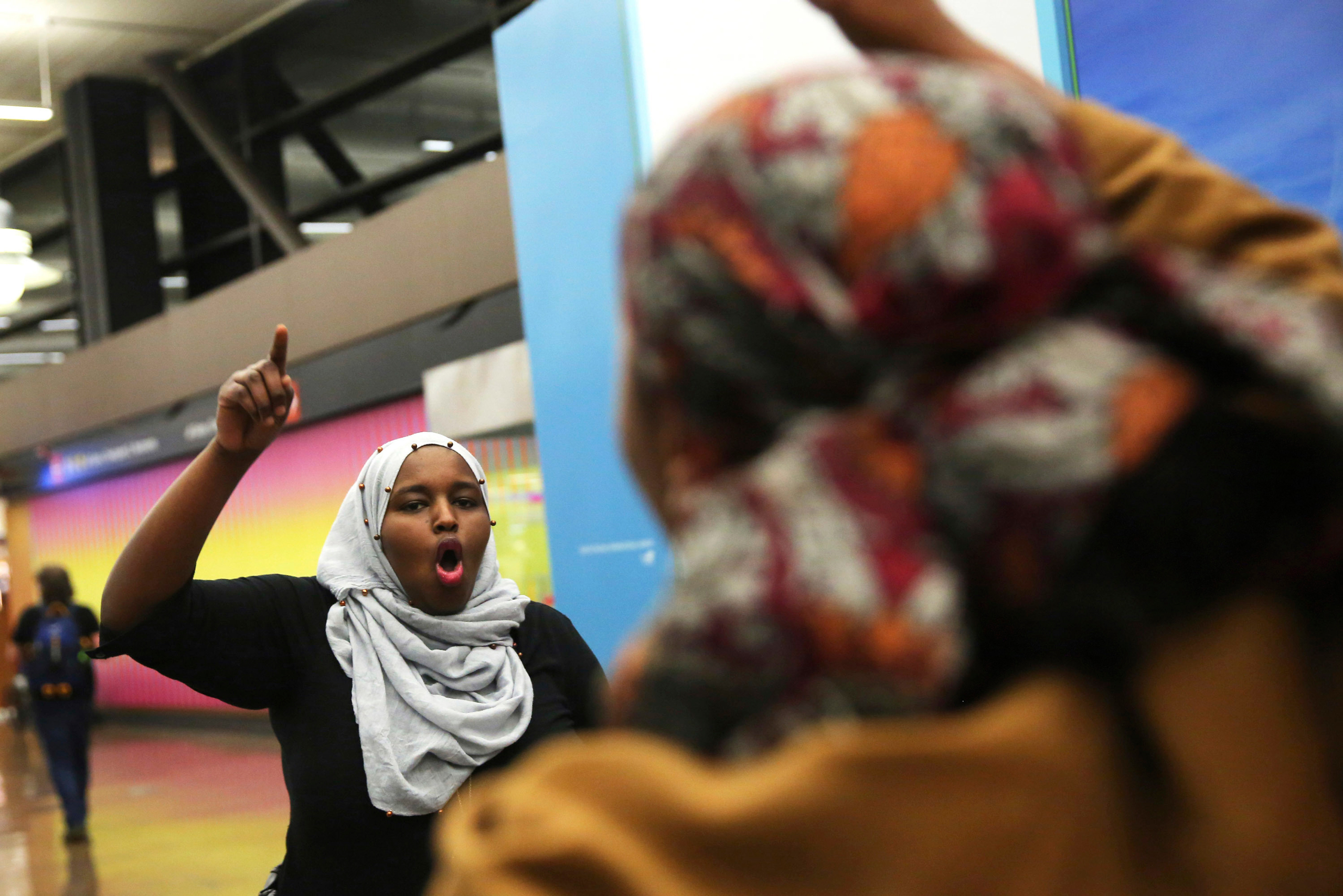 More than 1,000 people gather at Seattle-Tacoma International Airport to protest President Donald Trump's order that restricts immigration to the U.S., Saturday, Jan. 28, 2017., in Seattle. President Trump signed an executive order Friday that bans legal