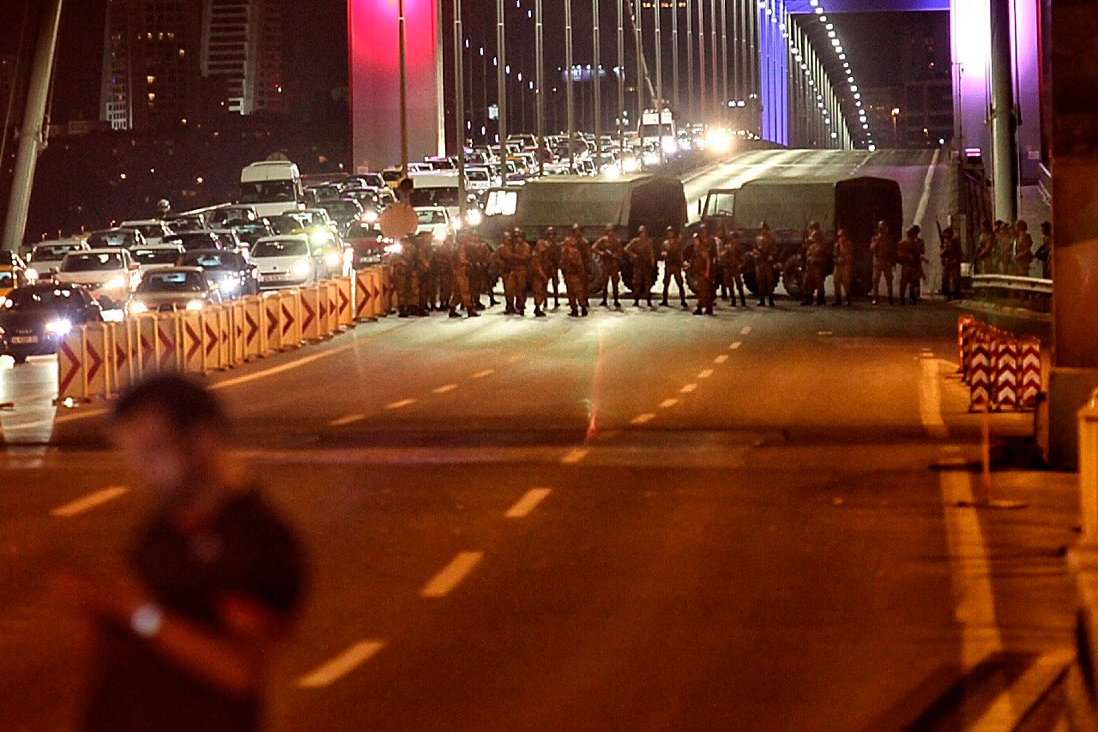 Turkish soldiers block Istanbul's Bosphorus Bridge, which separates the European and Asian sides of the city, on July 15, 2016.