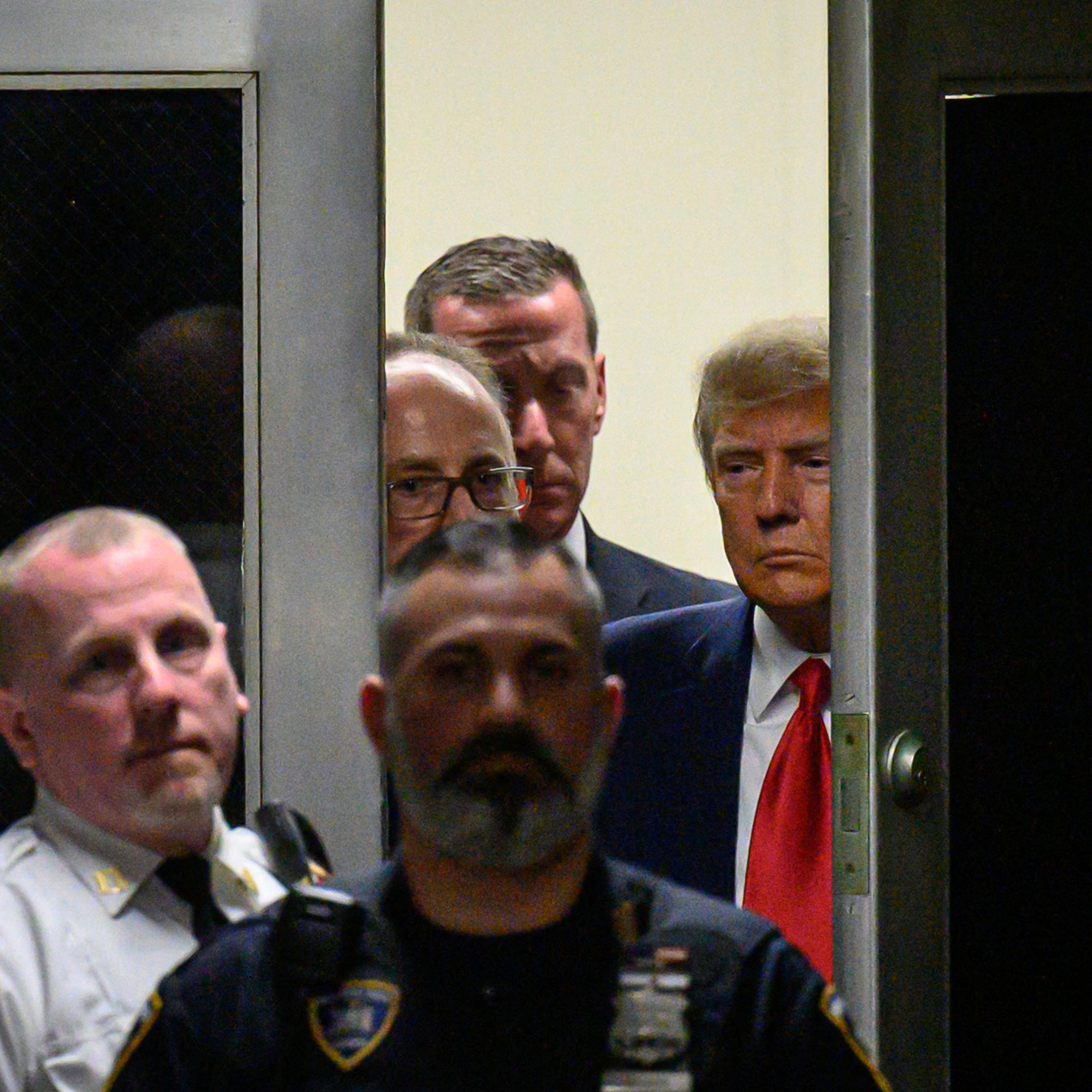 Former president Donald Trump arrives at the courtroom at the Manhattan Criminal Court on April 4, 2023.