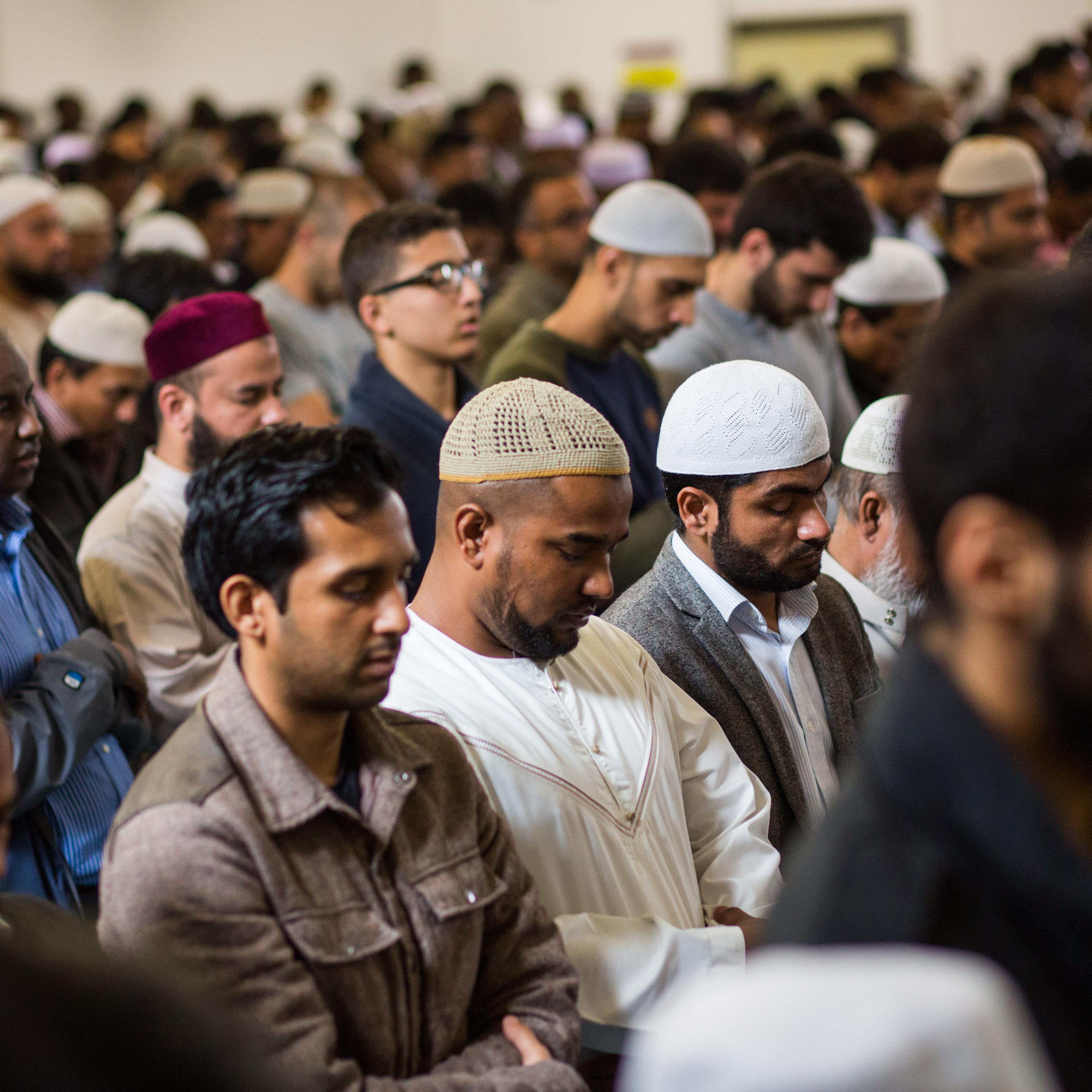 Men attend the first Friday prayers of the Islamic holy month of Ramadan at the East London Mosque on June 19, 2015 in London, England.