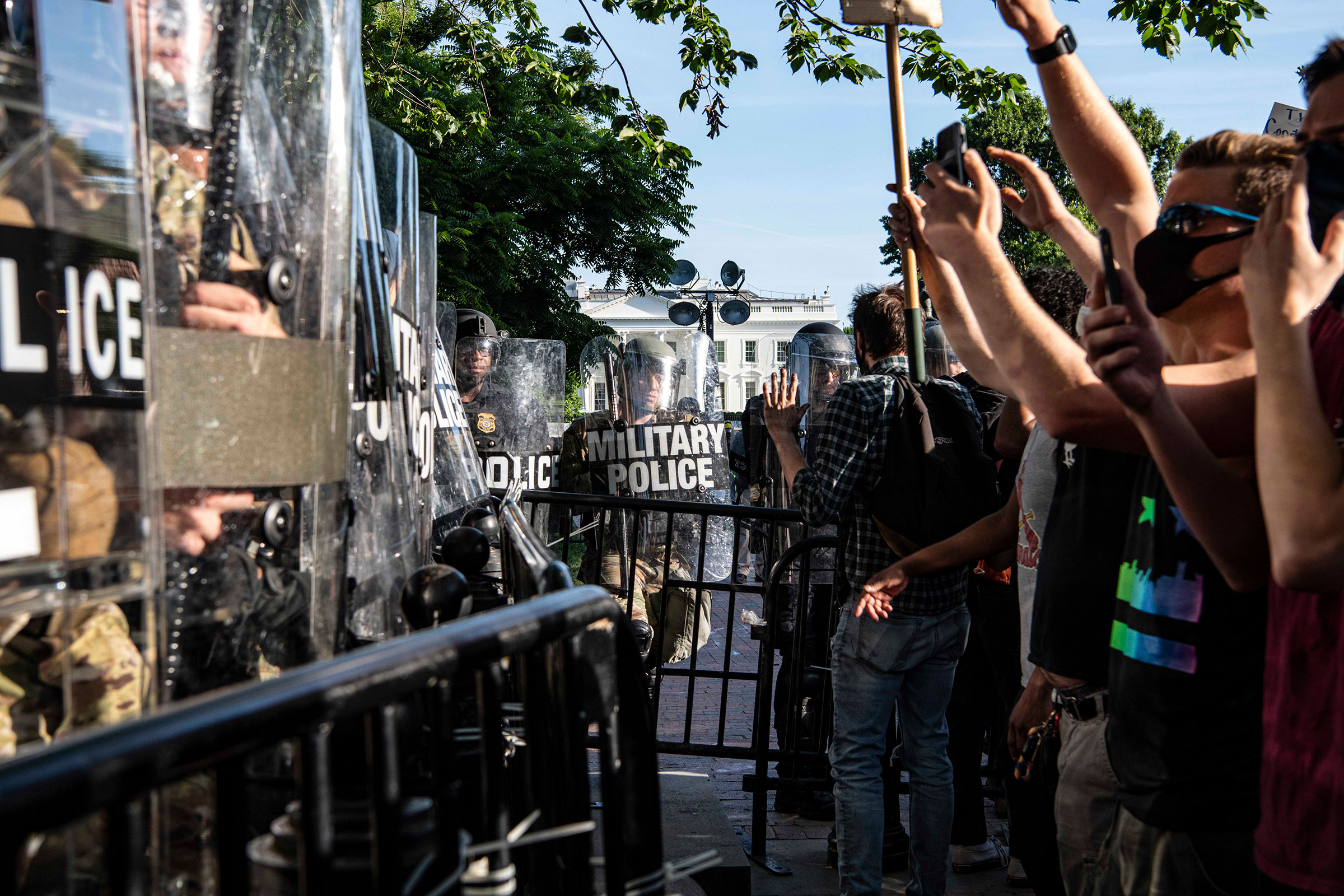 Law enforcement including Park Police, Metro Police Department and D.C. National Guard gather in Lafayette Square to face demonstrators protesting the death of George Floyd in Washington, D.C. on June 1, 2020.